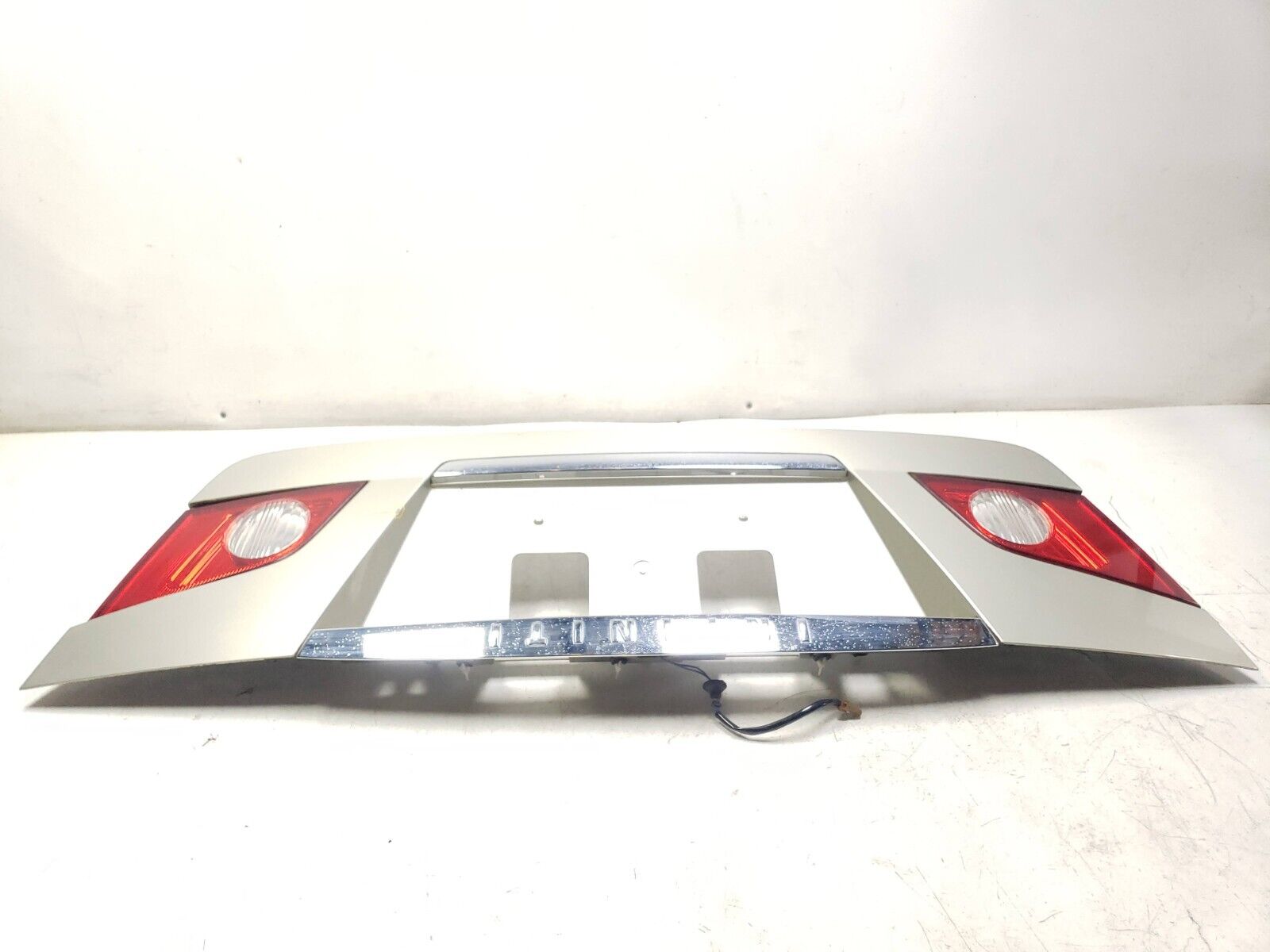 06-09 Infiniti M35 Trunk Trim Molding & License Plate Panel - OEM Replacement Part for Car Body Repair & Customization