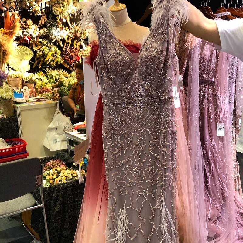 Serene Hill Lilac Mermaid V-Neck Evening Dress 2025 with Feathers & Beading - Luxury Sexy Formal Gown for Prom, Wedding & Red Carpet Events | LA70572