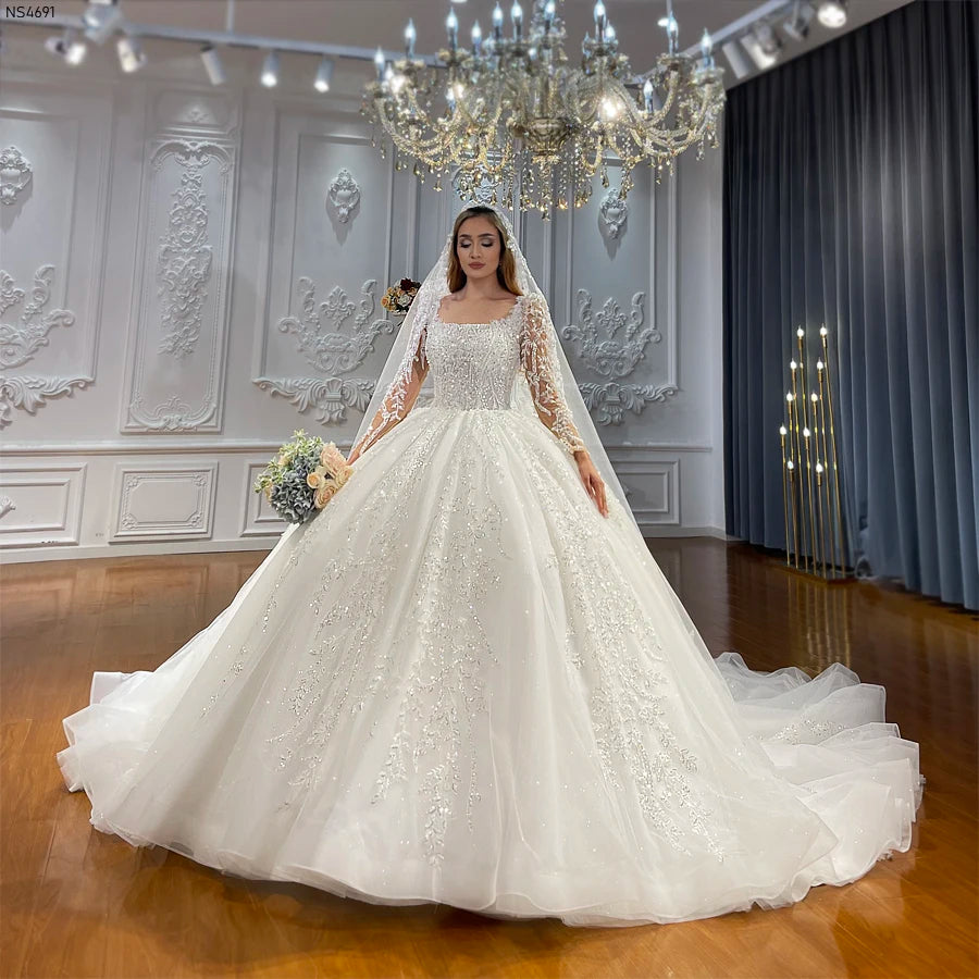 Elegant Long Sleeve Ball Gown Wedding Dress with Exquisite Lace Detailing - Perfect for Bridal Ceremonies, Formal Events & Vintage-Inspired Weddings