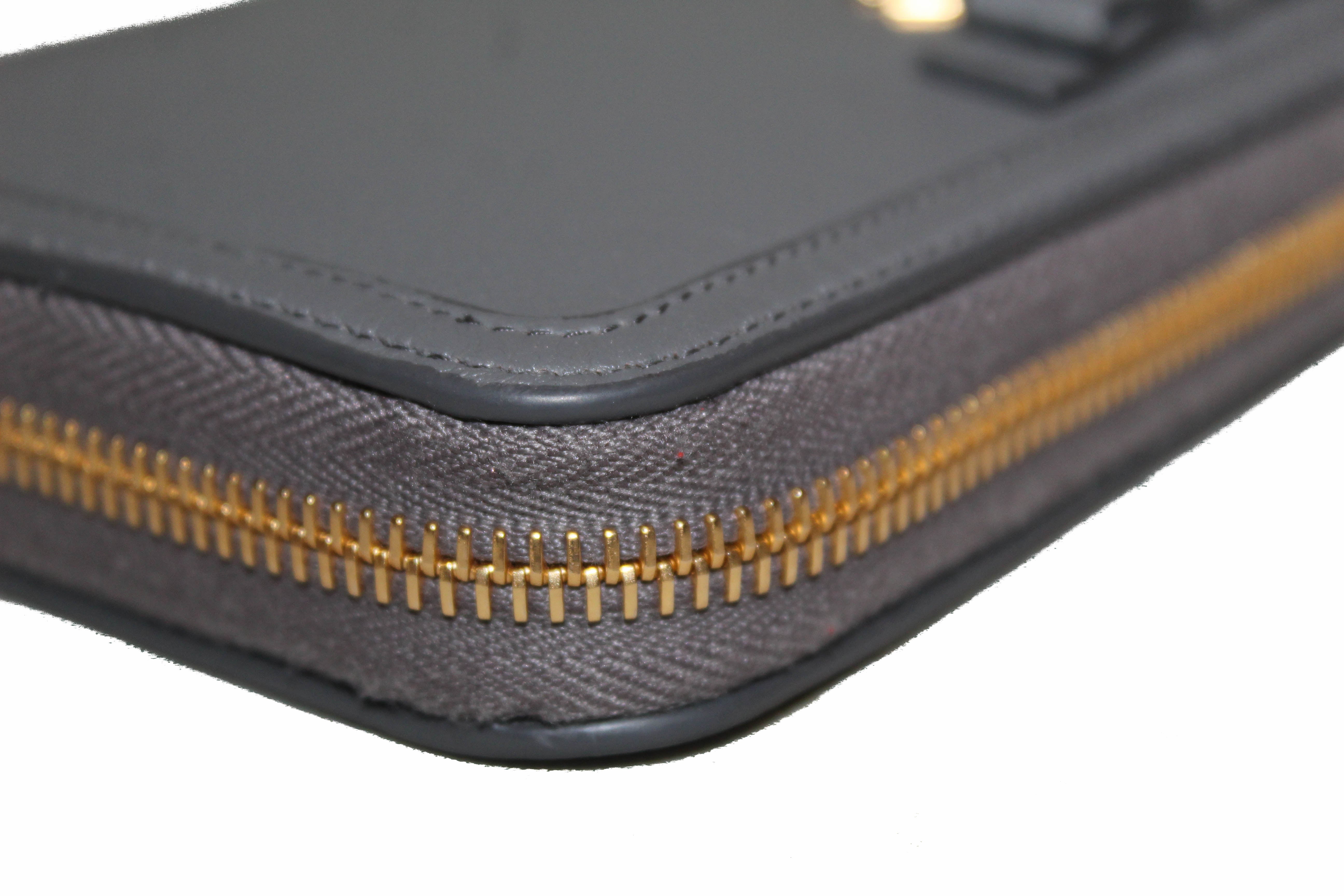 Authentic Prada Grey Leather Wallet for Women with Bow Detail - Stylish Continental Design for Everyday Use & Gift Giving