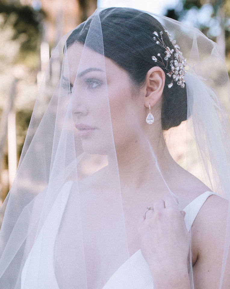 Elegant Pear Crystal Drop Earrings with Sparkling Details - Dianna at Kezani | Perfect for Weddings, Parties & Special Occasions