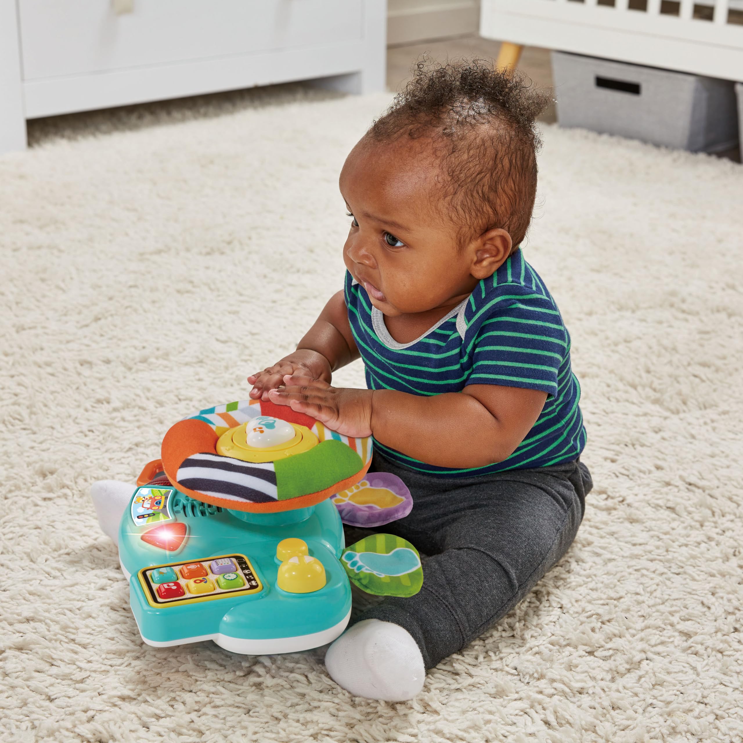 VTech Baby Steering Wheel Toy - Interactive Car Seat & Stroller Activity Toy with Lights, Sounds & Games - Best Gift for Babies 6+ Months - Spanish Language Content - Perfect for Road Trips & Stroller Rides
