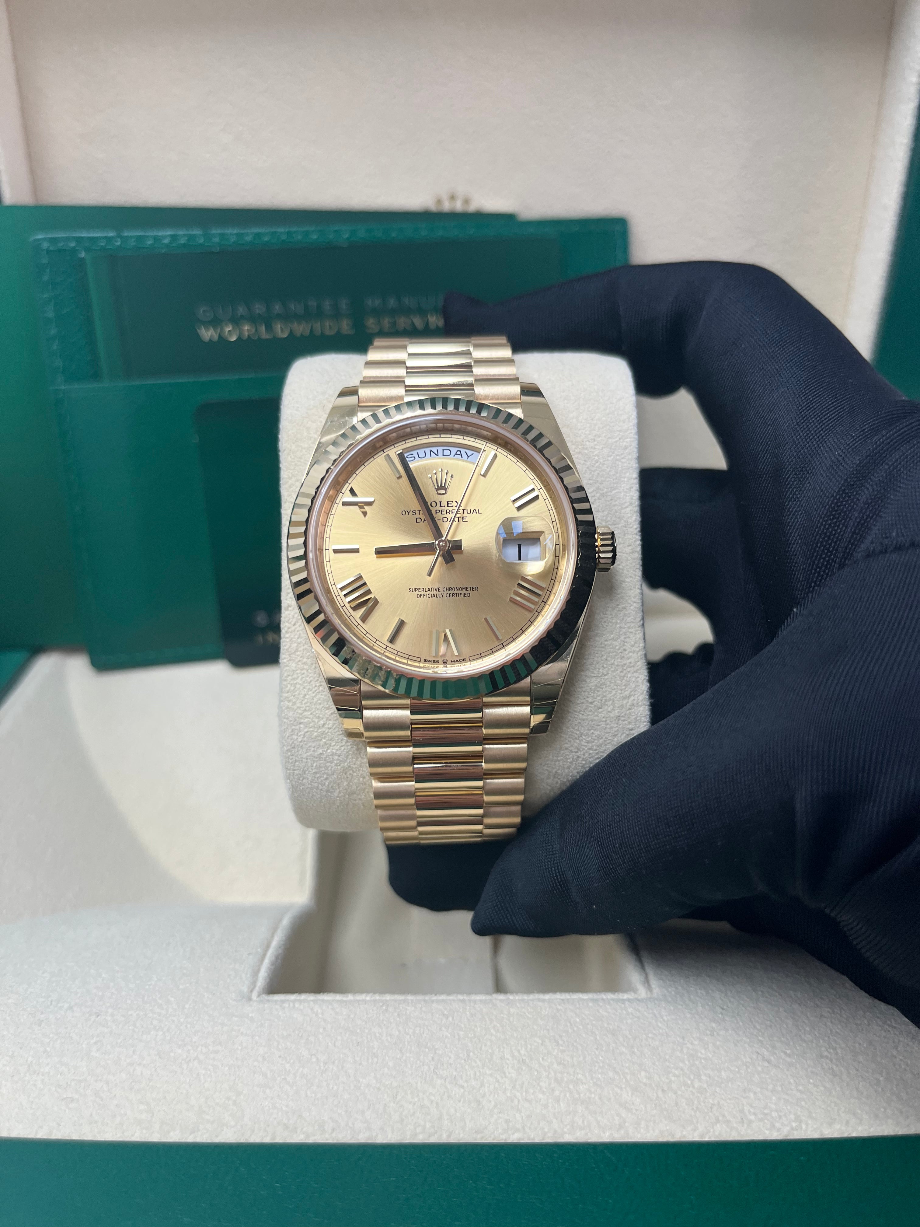 Rolex Day Date 40mm 18K Yellow Gold Men's Watch with Champagne Roman Dial & Fluted Bezel (Ref #228238) - Luxury Dress Watch for Business & Formal Occasions