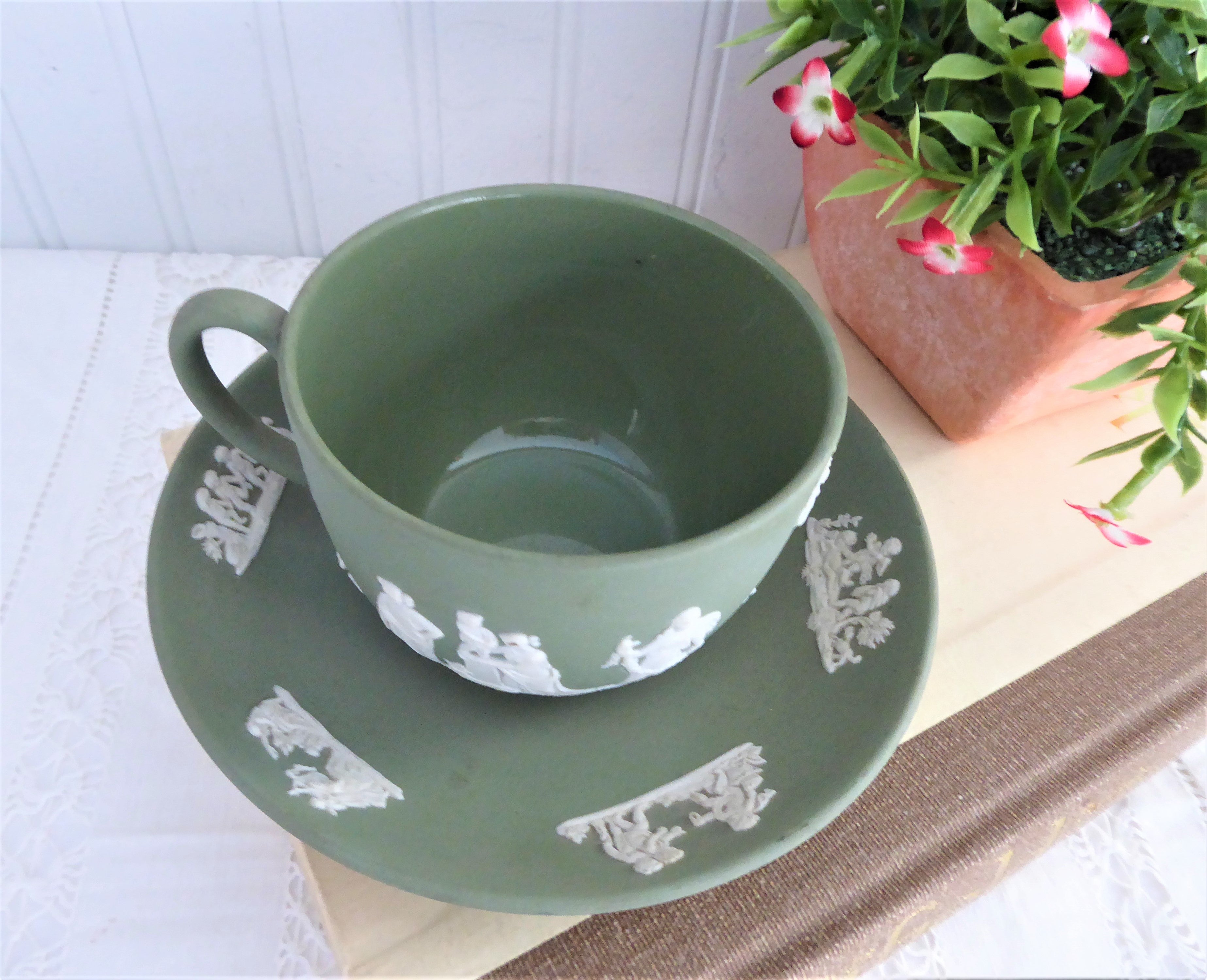 Vintage Wedgwood Green Jasperware Cup and Saucer Set with Cherub Sacrifice Figures - Made in England 1970s - Perfect for Tea Time, Collectible Display, and Wedgwood Enthusiasts