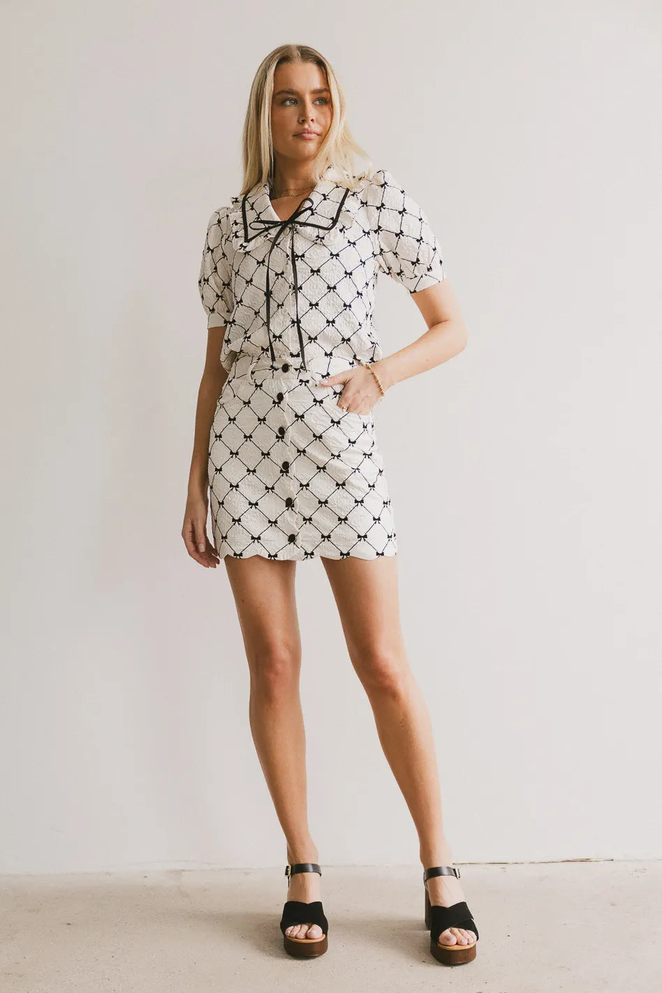 Maia Bow Mini Skirt - Women's Floral Print Pleated Skirt with Bow Detail | Perfect for Summer Outfits, Date Nights & Casual Wear