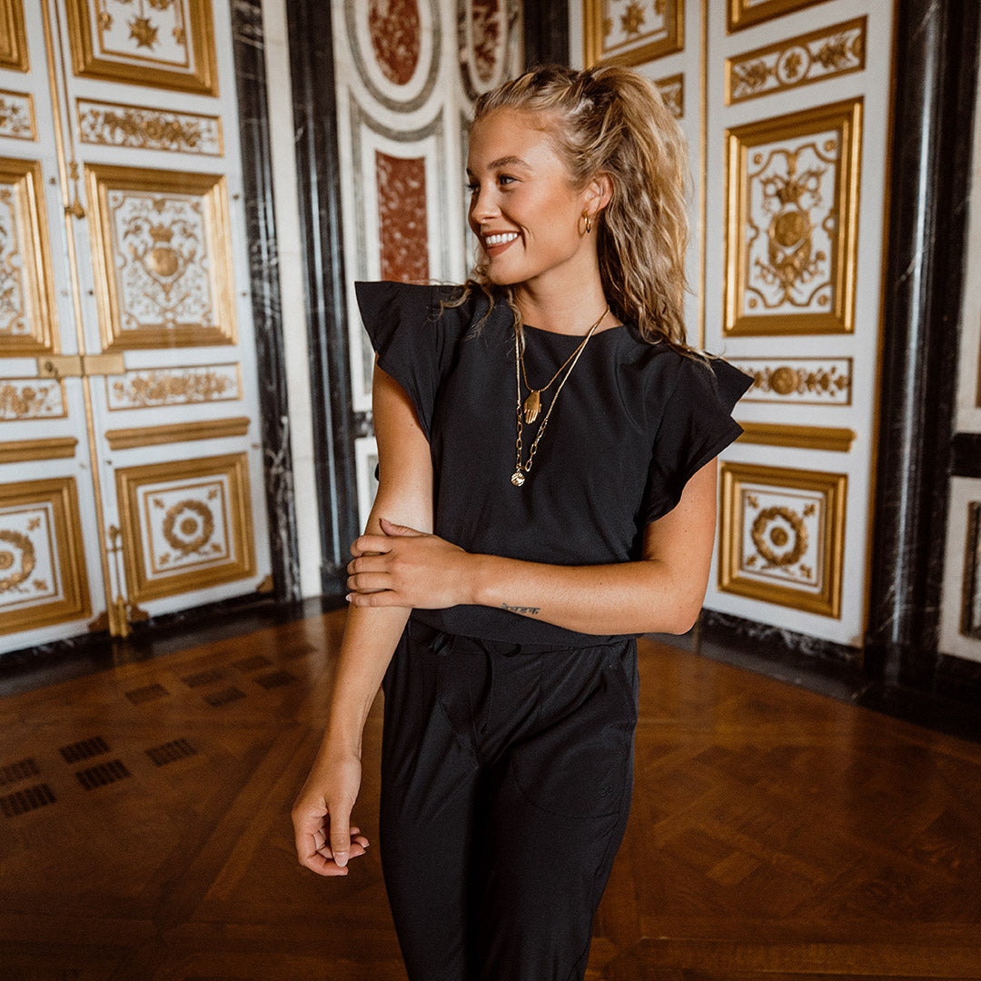 Black Flutter Sleeve Jumpsuit for Women - Elegant Wide Leg Romper with V-Neck | Perfect for Summer Parties, Date Nights & Beach Vacations