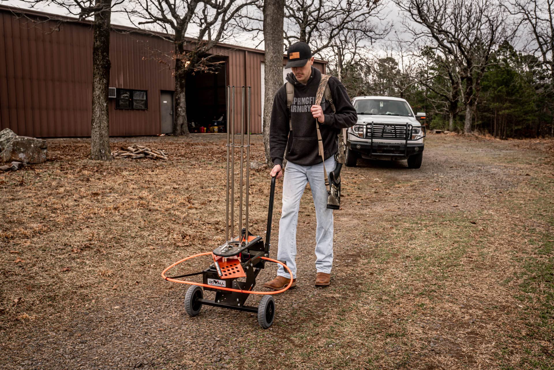FW80 Flyway 80 Automatic Clay Pigeon Trap with Wheels - Holds 80 Targets, Black/Orange - Perfect for Skeet Shooting, Hunting Practice & Outdoor Sports Training