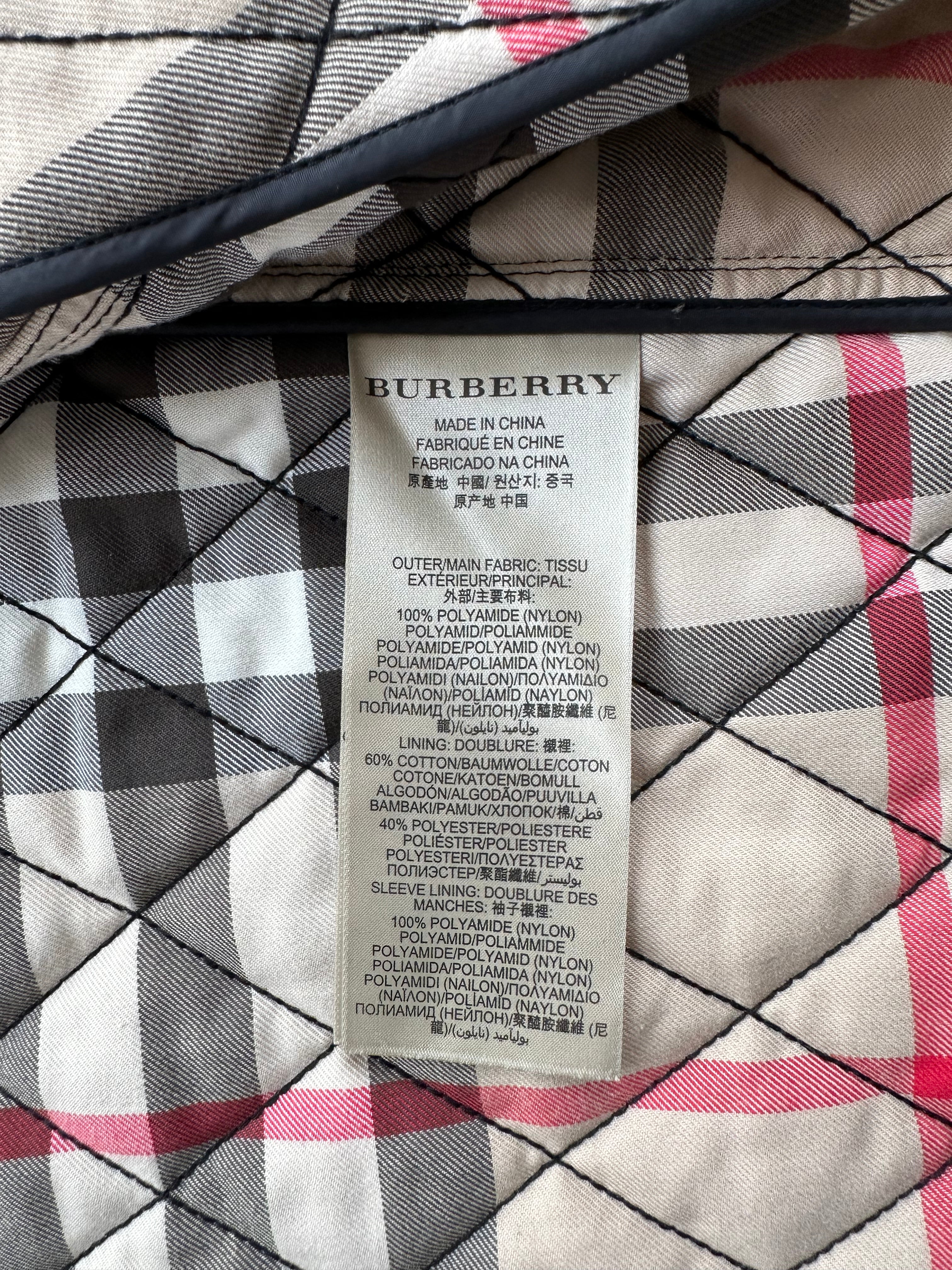 Burberry Brit Black Quilted Zip Up Jacket for Women - Stylish Winter Coat with Hood, Perfect for Outdoor Activities & Casual Wear