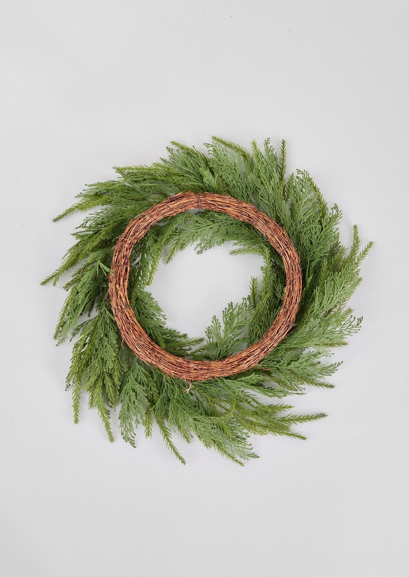 UV Treated Artificial Cedar Wreath - 24 Inch Faux Indoor & Outdoor Holiday Decor - Perfect for Christmas, Front Door, Fireplace & Seasonal Home Decorating