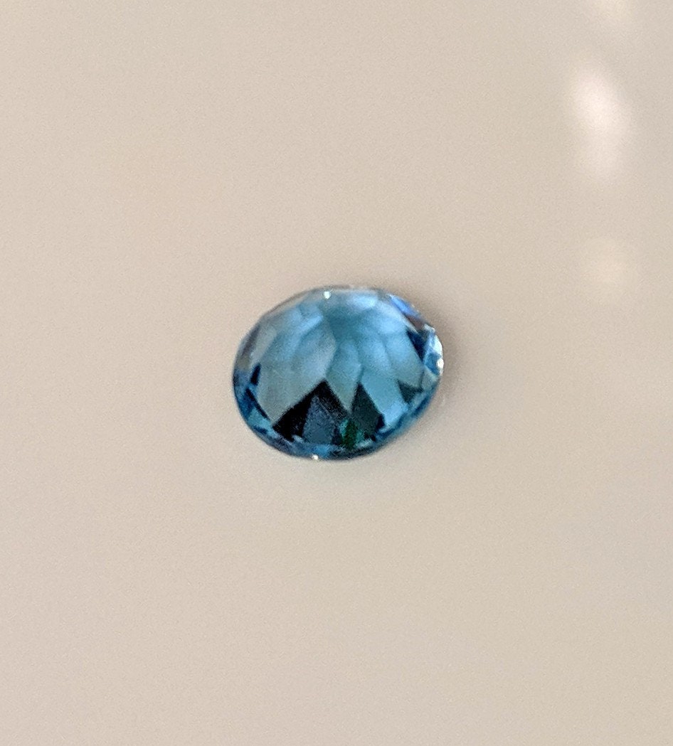 1.5ct Natural African Swiss Blue Topaz Loose Stone - 7mm Round, VVS Eye Clean, Exceptional Color & Clarity - Wholesale Gemstone for Jewelry Making, Engagement Rings & Unique Gifts