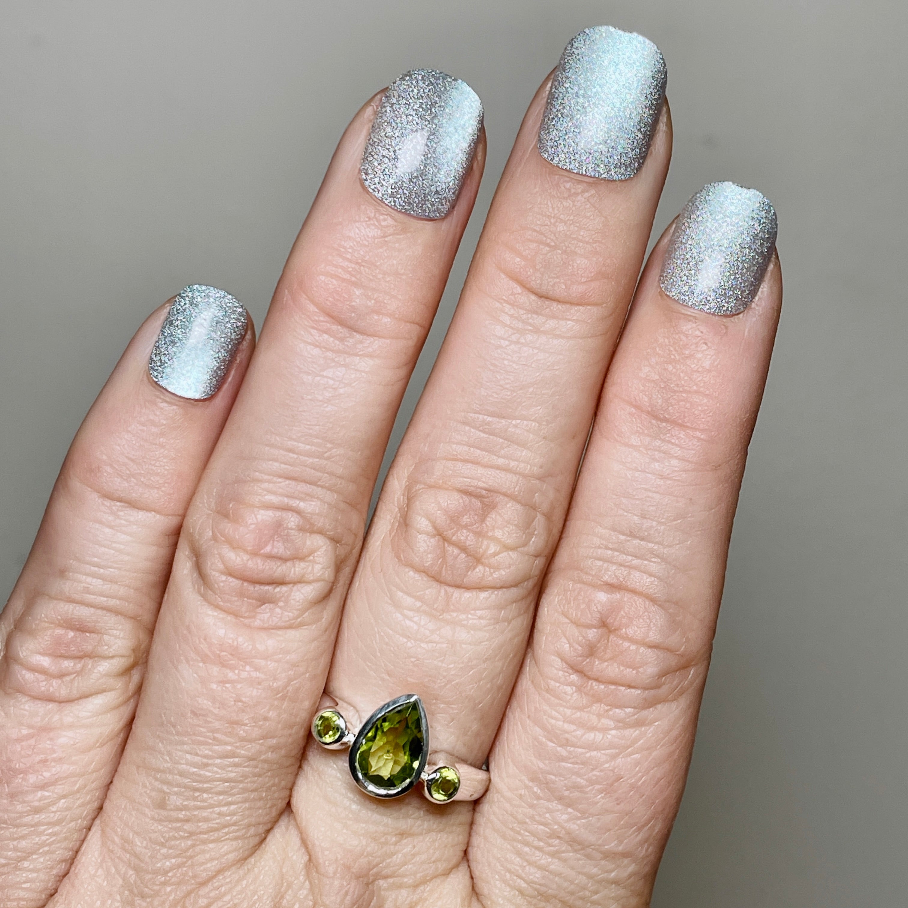 Peridot Faceted Gemstone Teardrop Ring with Accent Stones R3668 - Elegant Green Jewelry for Women, Perfect for Weddings, Parties & Special Occasions