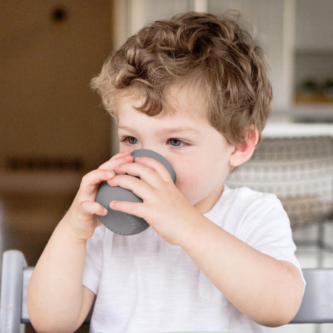 ezpz Mini Cup - Non-Spill Silicone Toddler Cup with Lid | Perfect for Baby's First Sippy Cup, Travel & Daycare Use