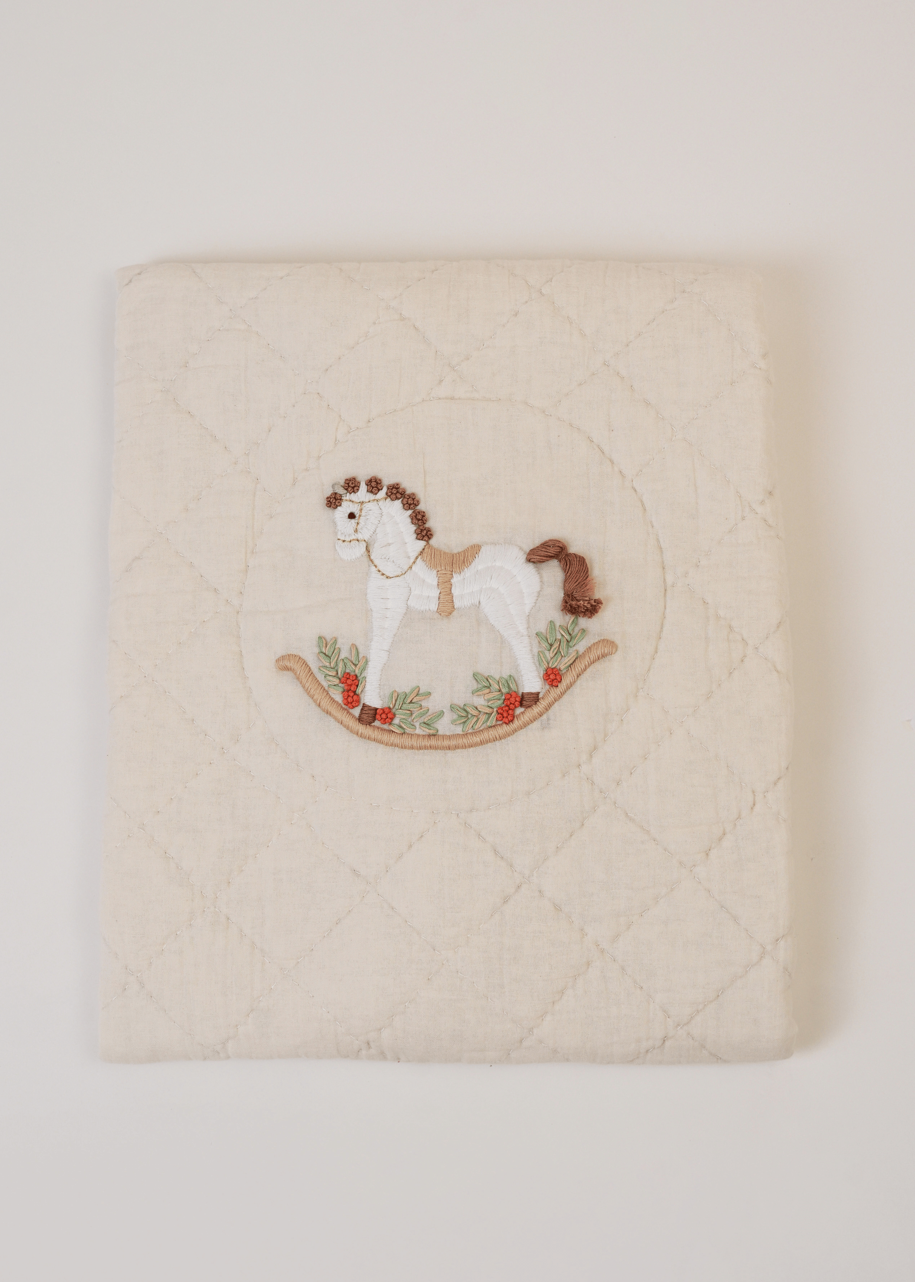 The Sleep Cloud Nest Ecru Baby Blanket with Rocking Horse Design - Soft & Cozy for Nursery, Swaddling, and Stroller Use
