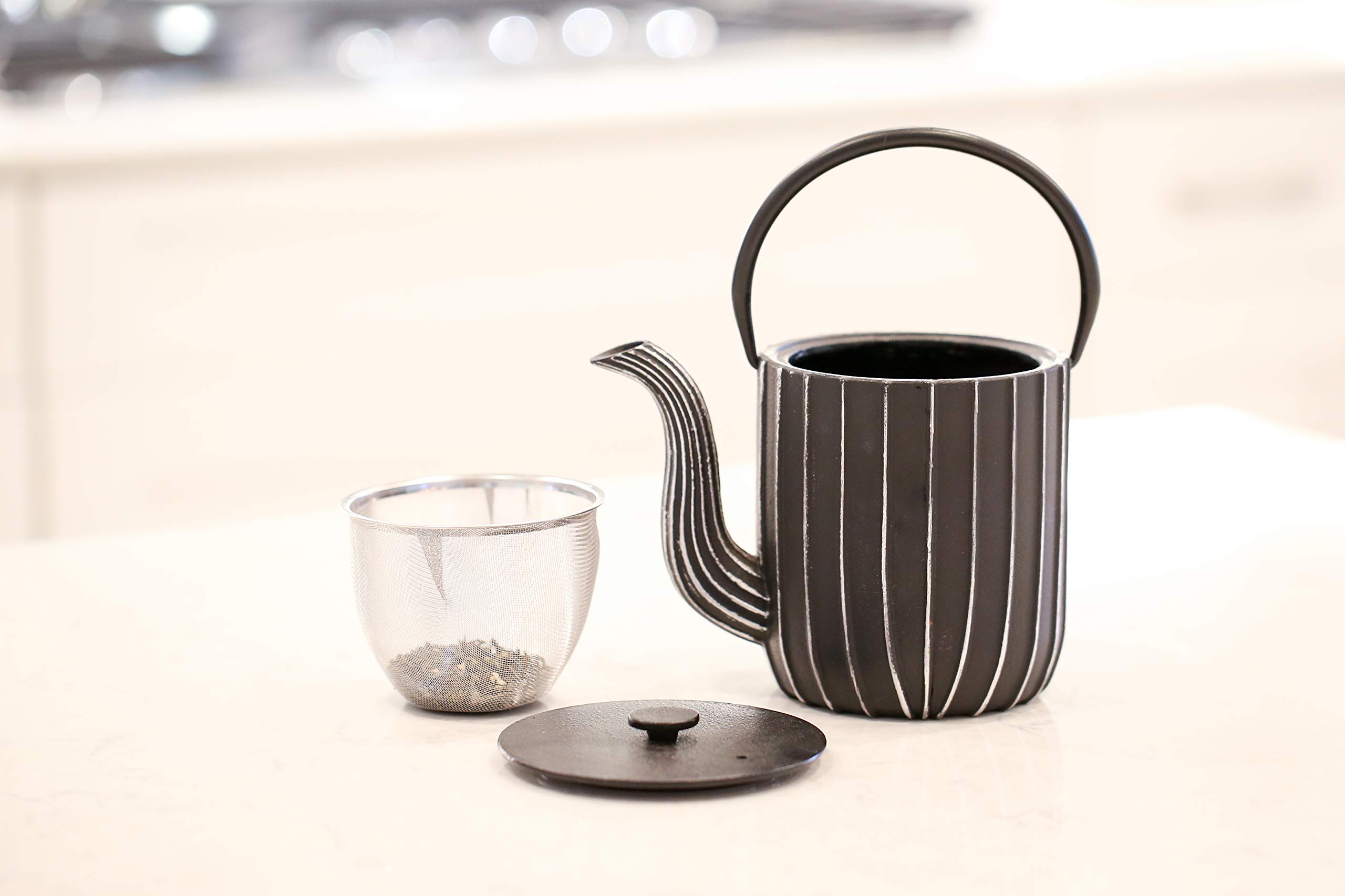 Frieling Ja by Mariage Cast Iron Teapot with Stainless Steel Infuser & Trivet - 34oz Black/Silver Stovetop Tea Kettle - Perfect for Home Brewing, Tea Parties & Gift Giving