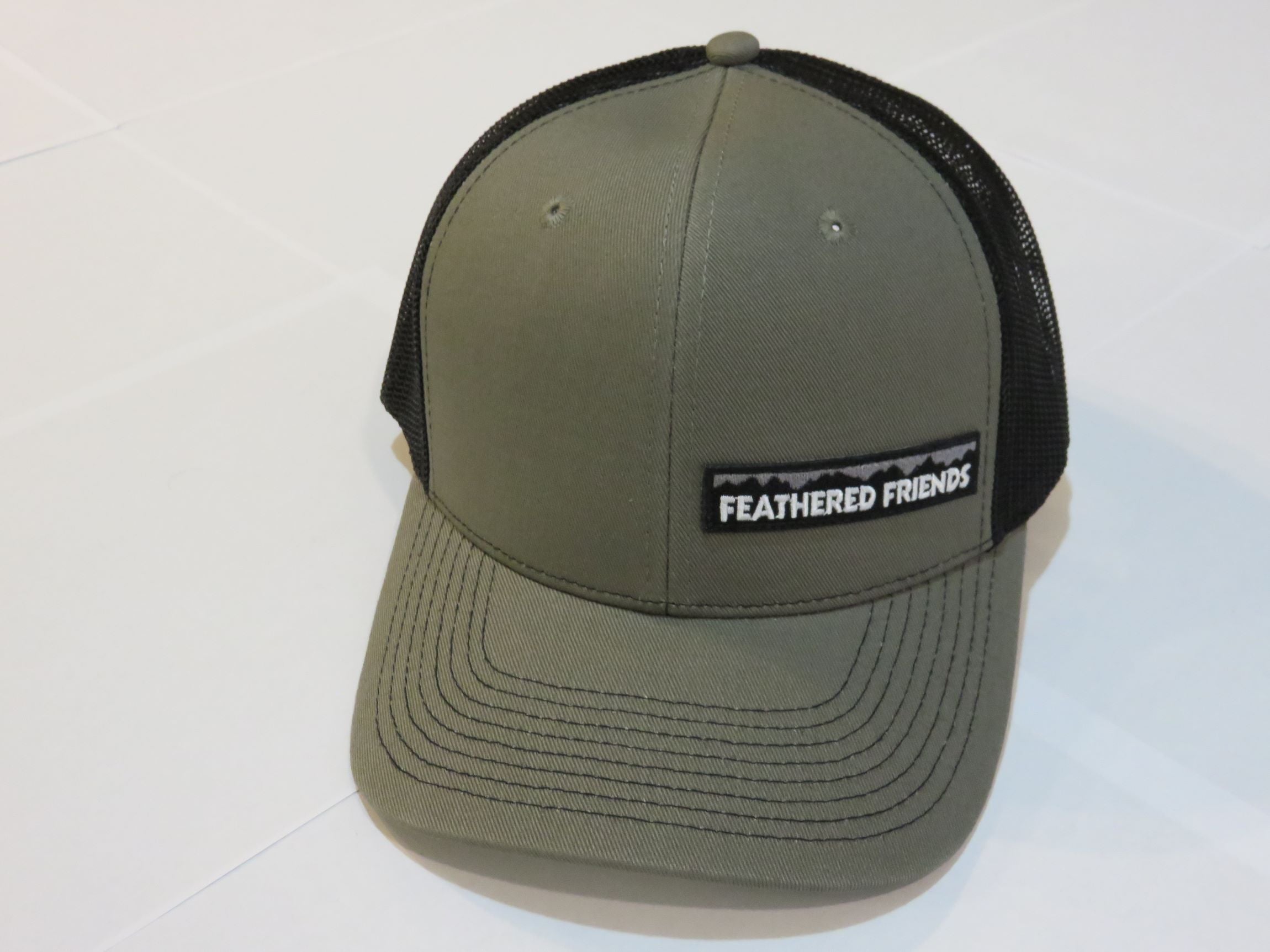 Feathered Friends Pro Style Trucker Offset Mountain Logo Patch Hat - Stylish Adjustable Cap for Outdoor Adventures, Hiking & Casual Wear