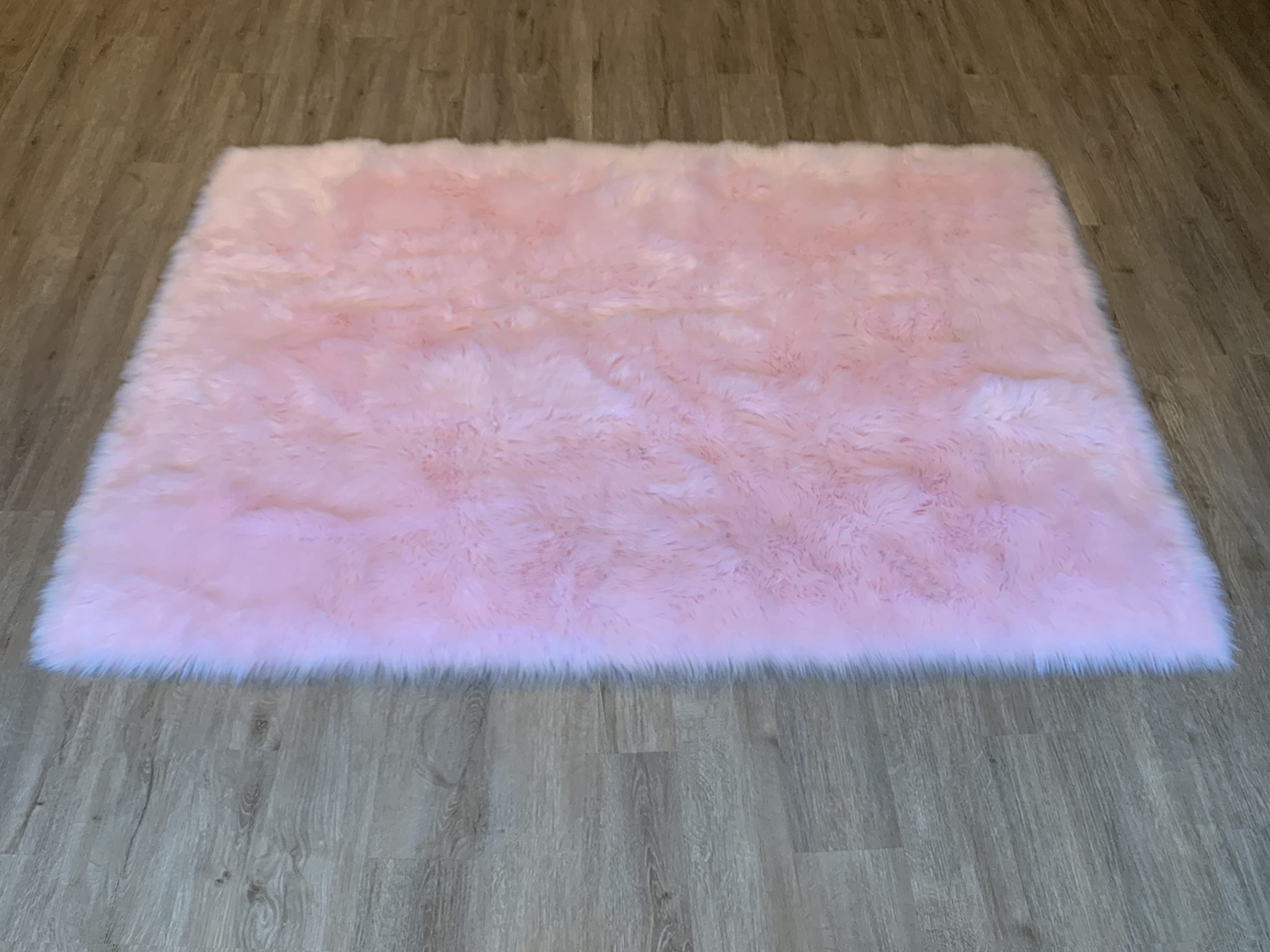 LAMBZY Faux Sheepskin Rug 2'x3' - Super Soft Hypoallergenic Shaggy Carpet for Living Room, Nursery, Bedroom - Plush & Silky Pink Throw Rug for Kids Room, Cozy Home Decor