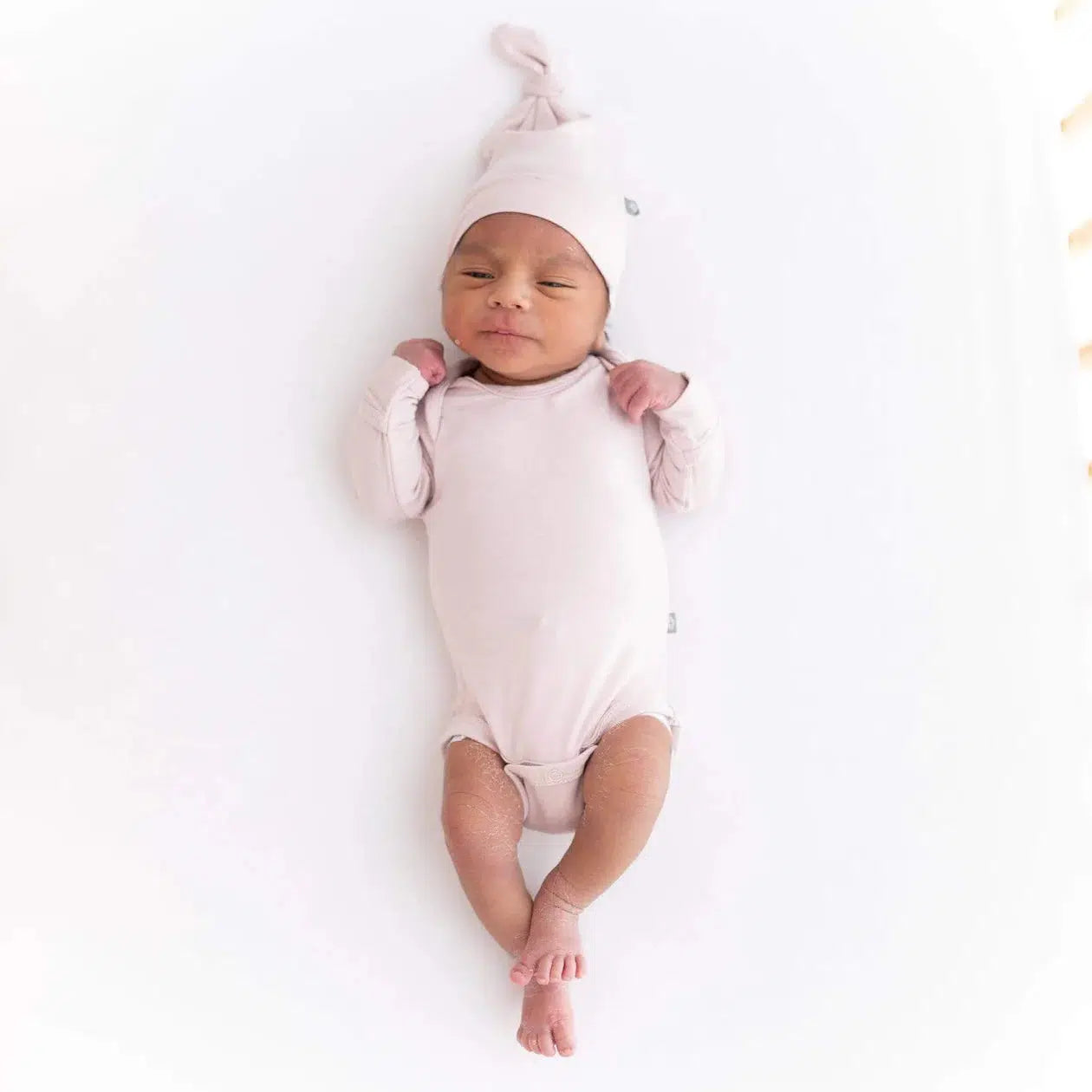 Kyte Baby Knotted Cap in Blush - Soft & Comfortable Newborn Beanie for Babies - Perfect for Hospital, Photo Shoots & Everyday Wear