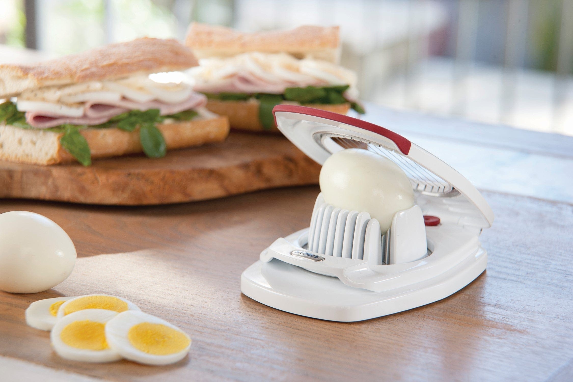 Zyliss Egg Cutter - Non-Slip Stainless Steel Egg Slicer & Wedger with Built-in Shell Piercer - Perfect for Salads, Sandwiches, and Breakfast Meal Prep