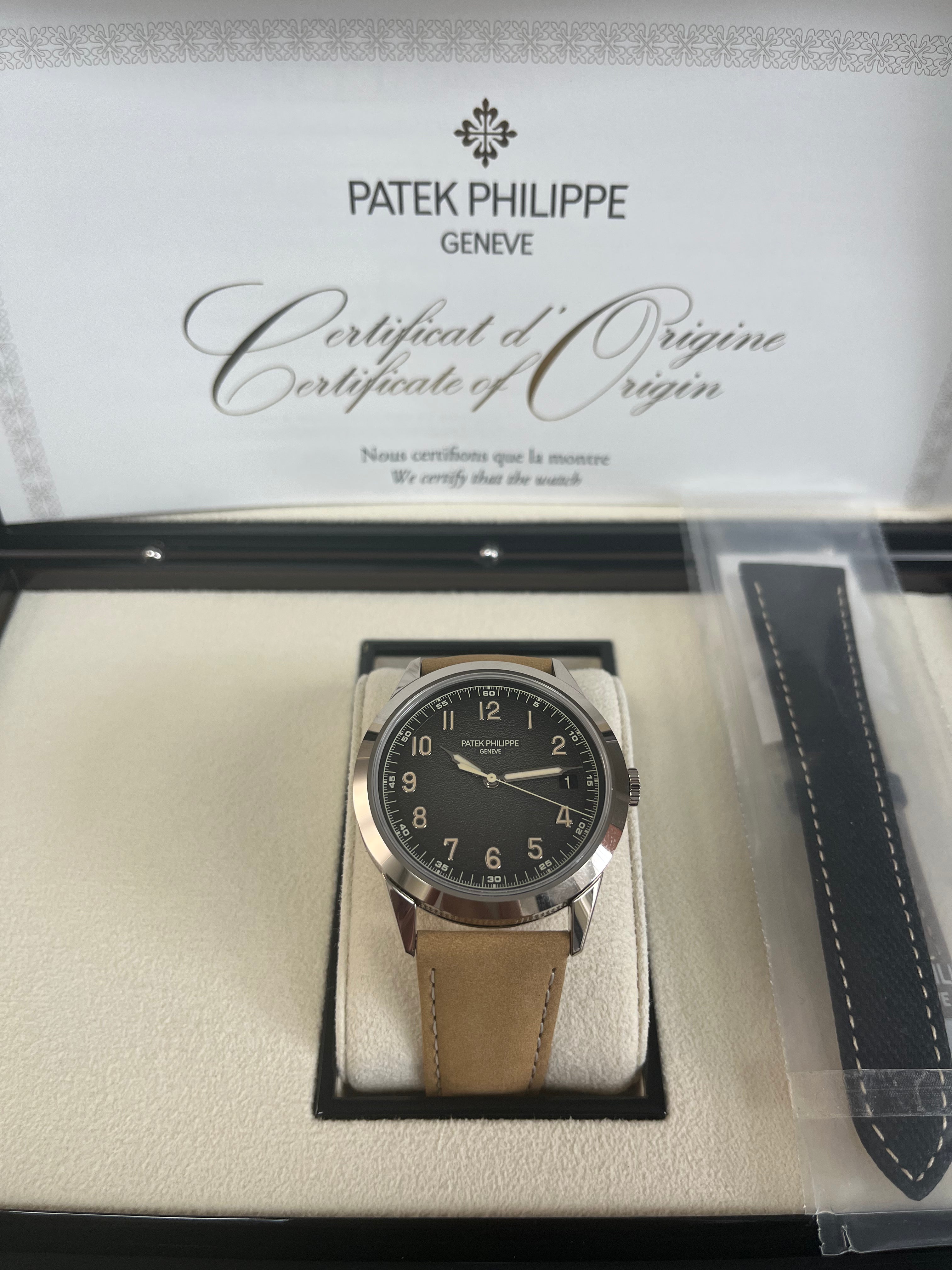 Patek Philippe Calatrava 5226G-001 40mm Men's Luxury Watch - 18K White Gold Case with Textured Dial - Perfect for Business Meetings & Formal Occasions