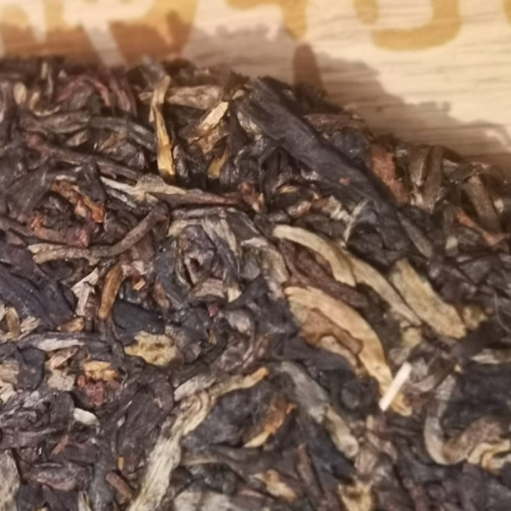 Premium Yiwu Sheng Pu'erh Tea Cake 200g - Ancient Tree Raw Pu-erh Tea, Millennium Edition | Best for Tea Collectors, Gifts & Relaxing Tea Time