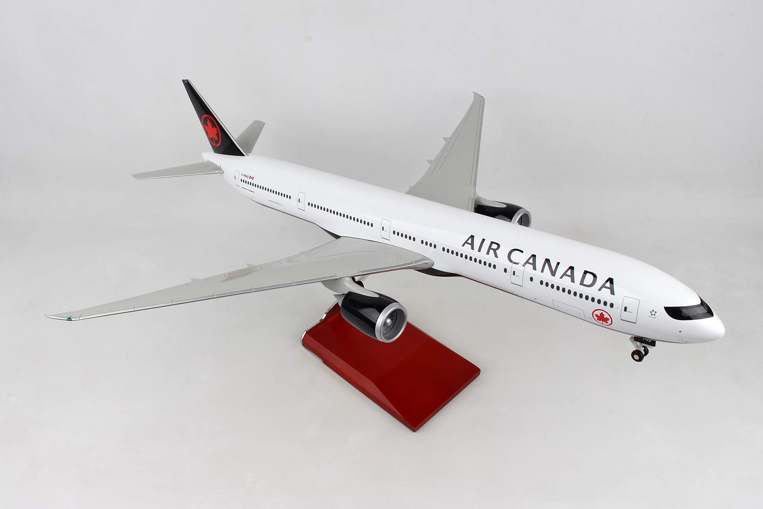 Daron 1/100 Scale Air Canada Boeing 777-300ER Diecast Model Airplane with Wood Display Stand & Landing Gear - Collectible Aircraft for Aviation Enthusiasts, Home Office Decor & Gift for Plane Lovers