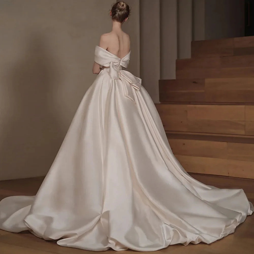 Elegant Off Shoulder Sweetheart Neck Beaded Bow Satin 2-Piece Mermaid Wedding Dress with Detachable Train - Perfect for Beach, Church, and Formal Wedding Ceremonies