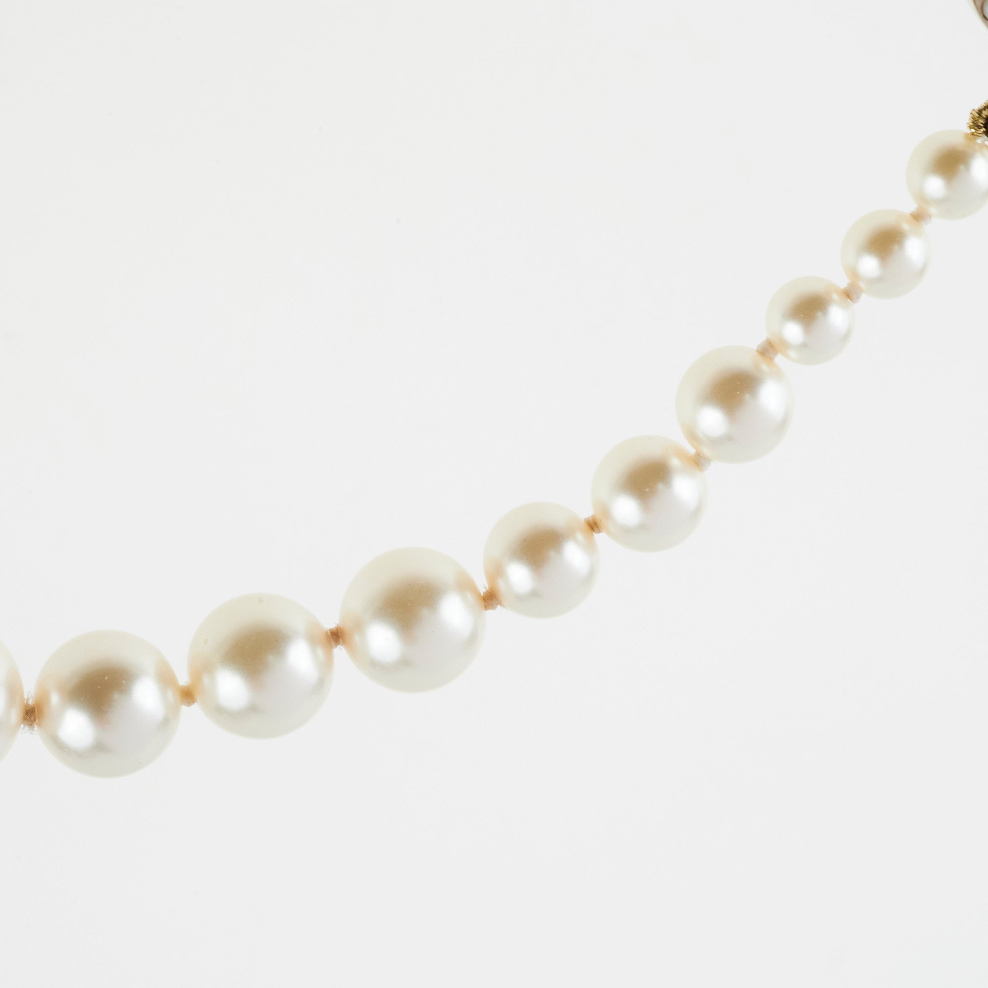 Chanel Long Pearl CC Logo Necklace - Elegant Costume Jewelry for Women | Perfect for Parties, Weddings & Special Occasions