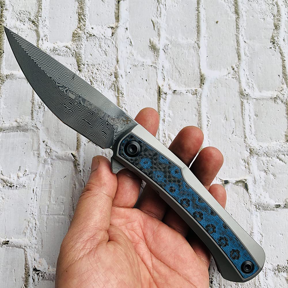 Kansept Kratos Damascus Folding Pocket Knife - 8.69in Titanium Handle with Blue Black Fat Carbon Fiber Inlays, 3.79in Clip Point Blade - EDC, Outdoor, Hunting, Camping, Survival Gear - Perfect for Everyday Carry, Bushcraft & Tactical Use