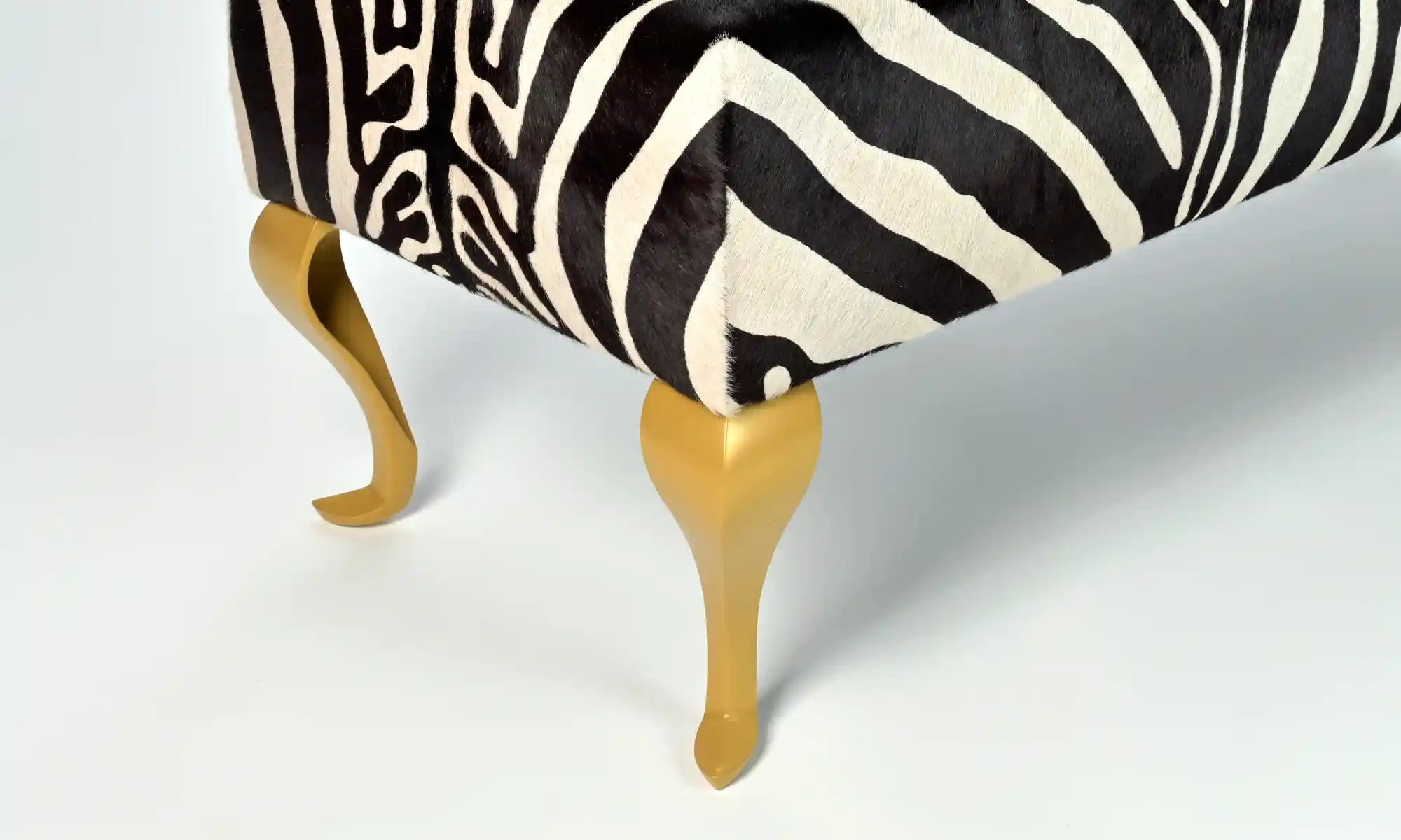 Stylish Zebra Print Ottoman with Gold Queen Anne Legs - 43.3x17.7x18.1 Inches - Perfect for Living Room, Bedroom or Office Decor