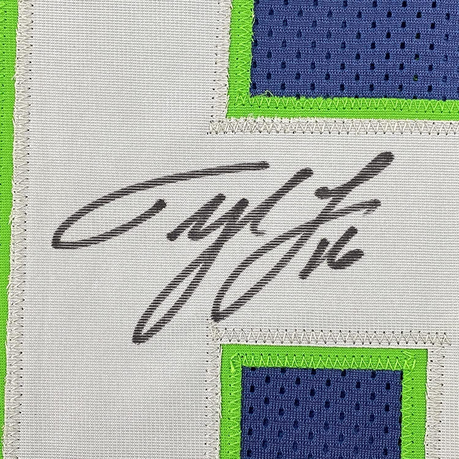 Framed Autographed Tyler Lockett Seattle Seahawks Football Jersey 35x39 with JSA COA - Perfect for Sports Memorabilia Collectors and Seahawks Fans