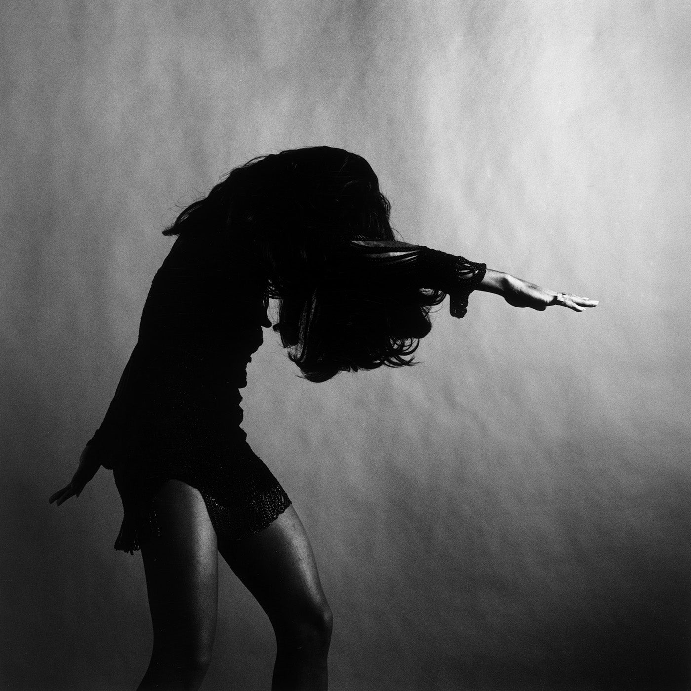 Tina Turner Head Down Arms Out Photo - Premium Getty Images Download for Music Blogs & Fan Tributes