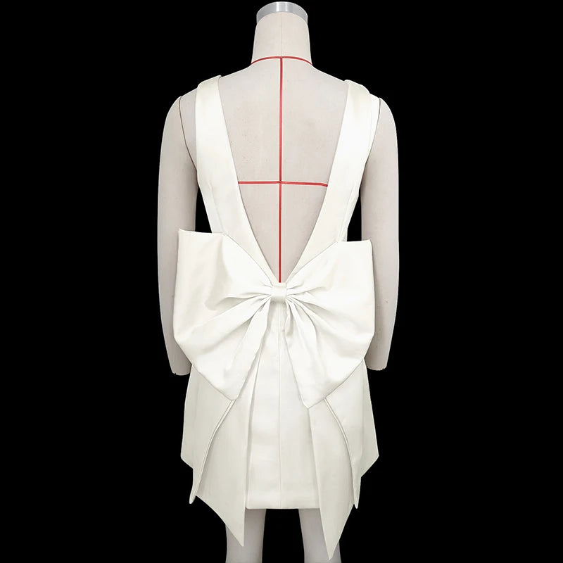 Sexy Backless Mini Dress for Women - Elegant Bow Sleeveless Club Dress with High Waist & Solid O-Neck Design | Perfect for Nightclub Parties, Date Nights & Special Occasions