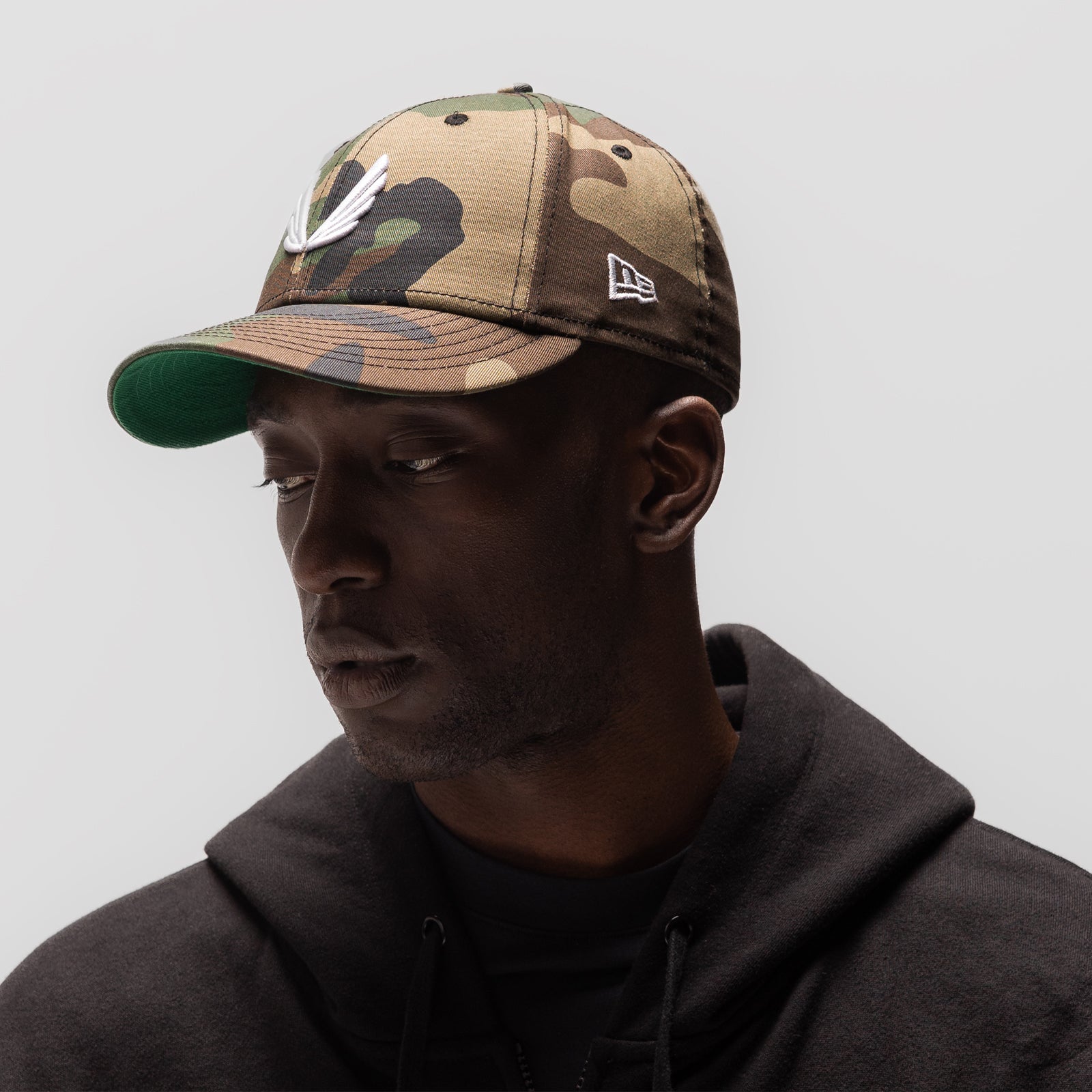 New Era® 59Fifty® Low Profile Snapback Hat - Woodland Camo with White Wings Design | Adjustable Fit for Men & Women | Perfect for Outdoor Sports, Concerts & Streetwear Fashion