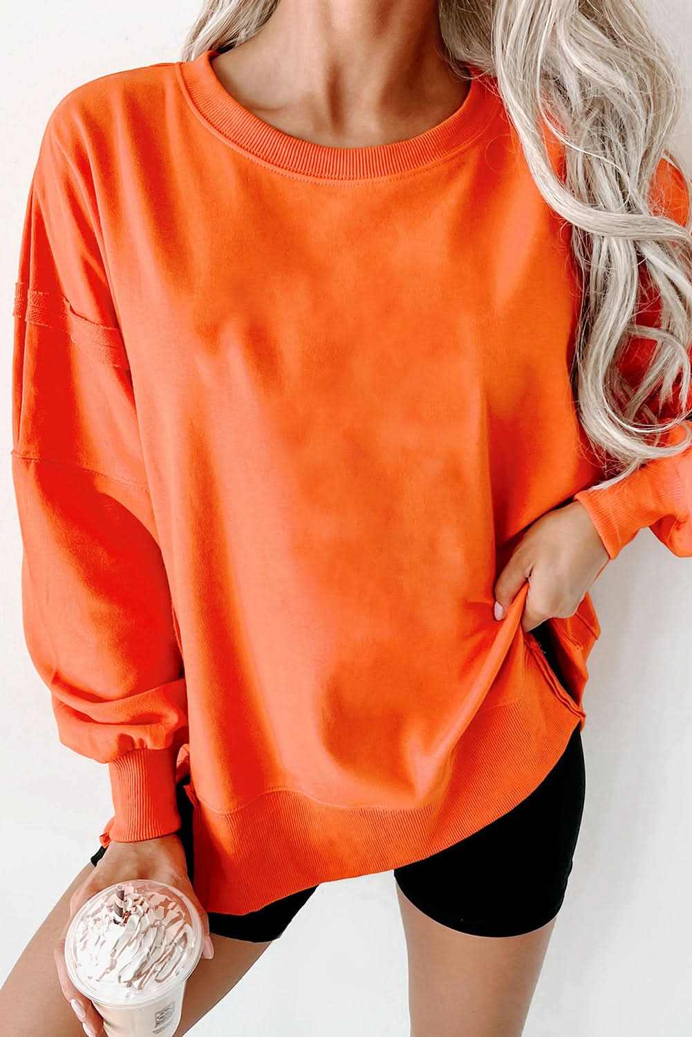 Carrot Exposed Seam Drop Shoulder Round Neck Sweatshirt with Side Slits | Oversized Casual Pullover | Perfect for Streetwear, Loungewear & Everyday Fashion