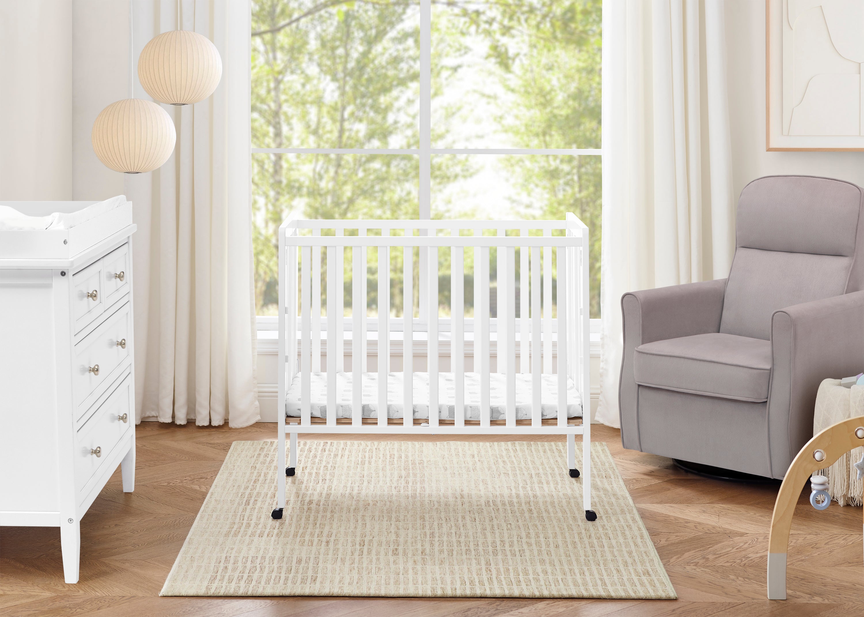 Lee Portable Folding Mini Crib with 1.5 Inch Mattress - Lightweight Travel Crib for Babies & Toddlers - Perfect for Home, Travel, and Daycare Use