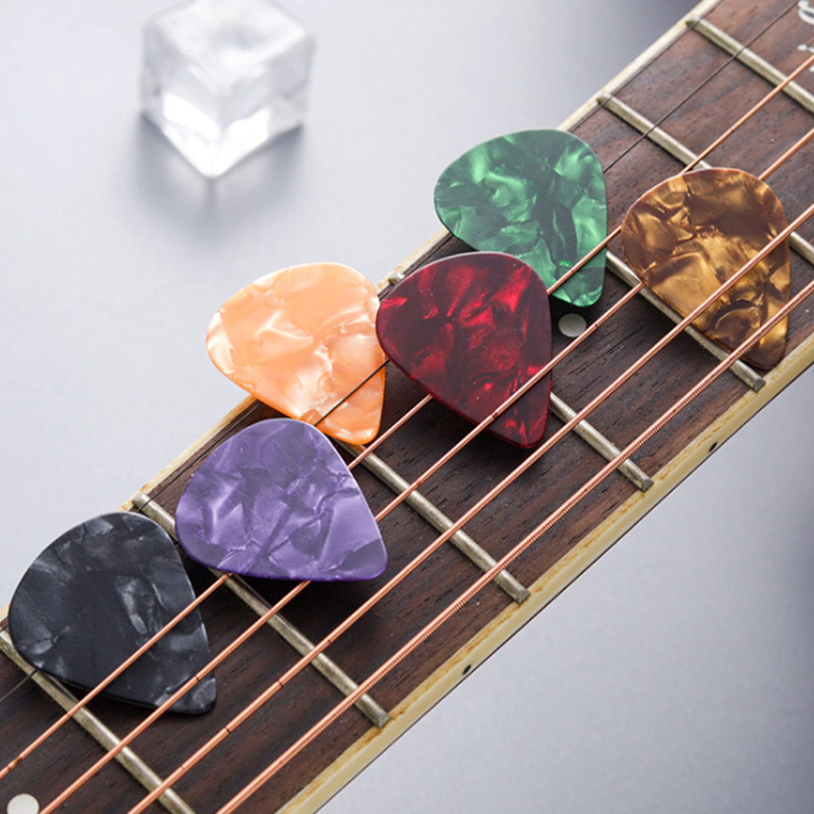 48Pcs Silicone Guitar Finger Protectors - 4 Sizes Finger Guards with 5Pcs Thumb & Forefinger Picks + 10 Guitar Picks for Ukulele, Electric Guitar - Perfect for Practice, Beginners & Long Playing Sessions