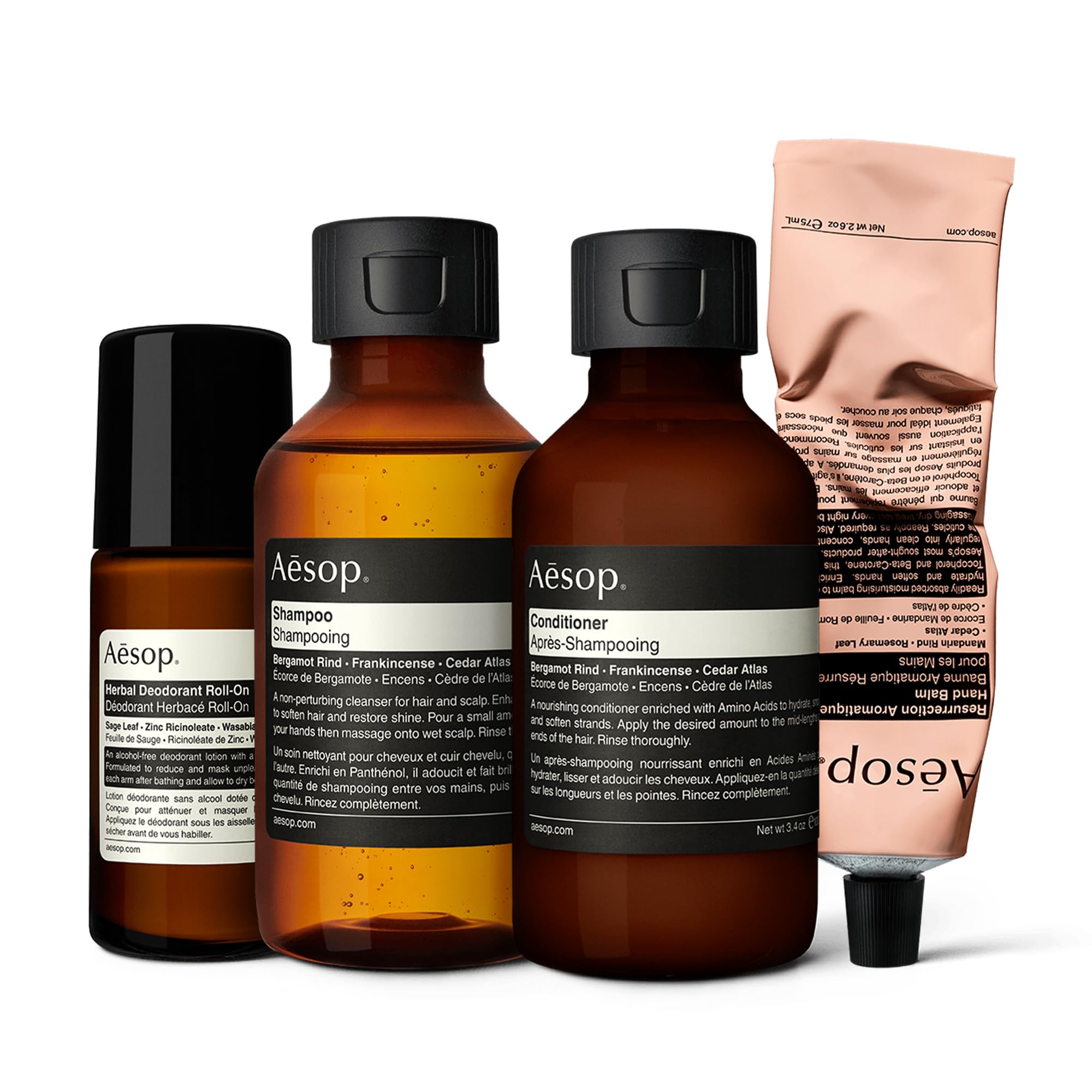 Aesop Travel Essential Kit - Shampoo (3.3 Oz), Conditioner (3.3 Oz), Resurrection Hand Balm (2.5 Oz) & Deodorant Roll-on (1.7 Oz) | Paraben-Free, Cruelty-Free, Vegan Skincare Set | Perfect for Travel, Gym & On-The-Go Self Care