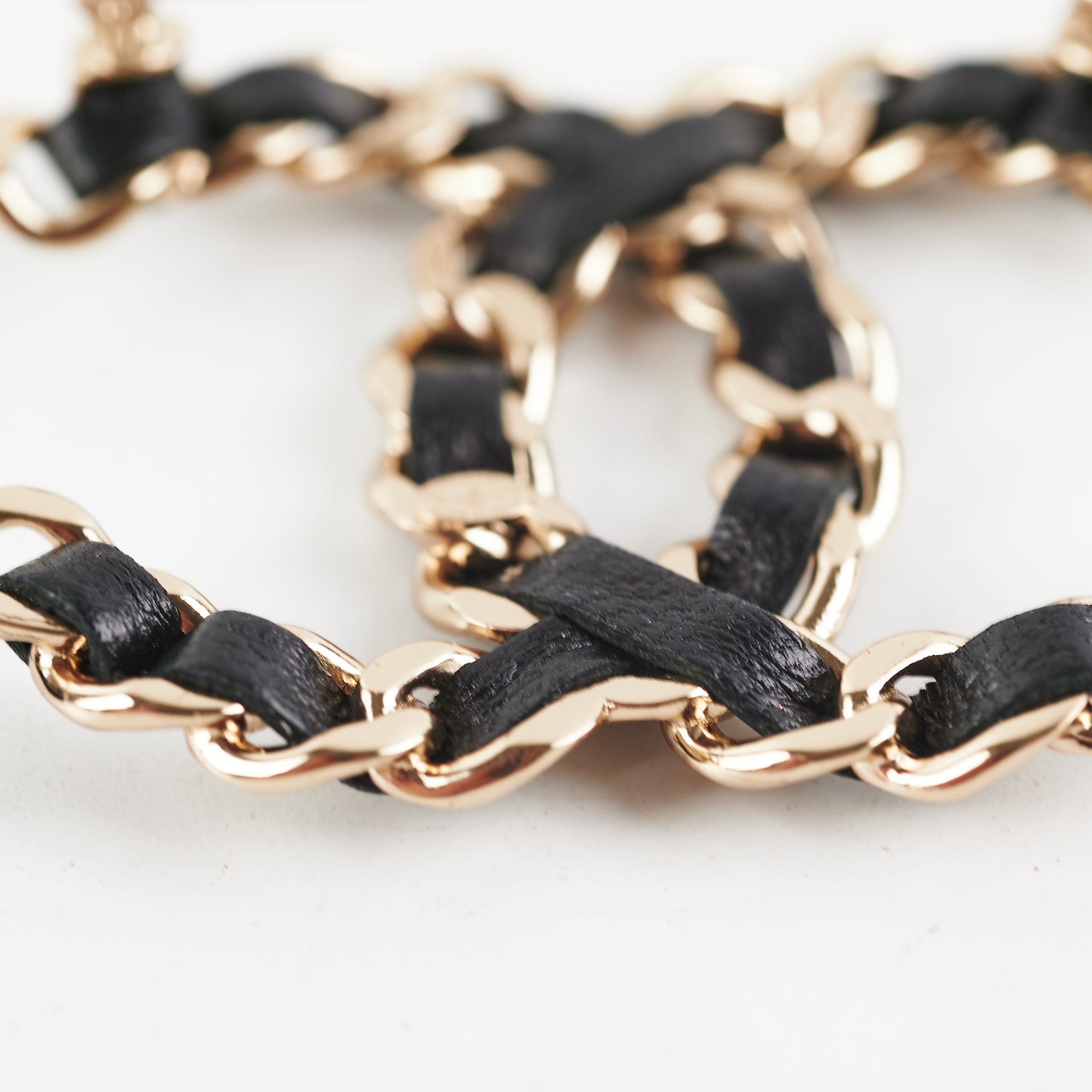 Chanel CC Leather Brooch - Black Fashion Jewelry for Women | Elegant Accessory for Dresses, Jackets & Bags