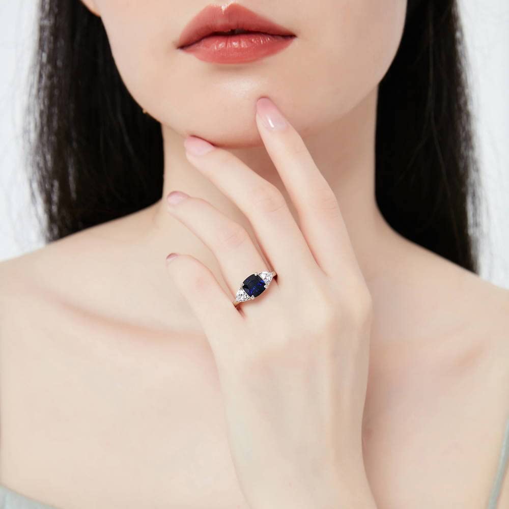 BERRICLE Sterling Silver 3-Stone Wedding & Engagement Ring Set - 3 Carat Simulated Blue Sapphire Cushion Cut Cubic Zirconia CZ Infinity Band for Women, Rhodium Plated Size 4-10 - Perfect for Proposals, Anniversaries & Bridal Jewelry
