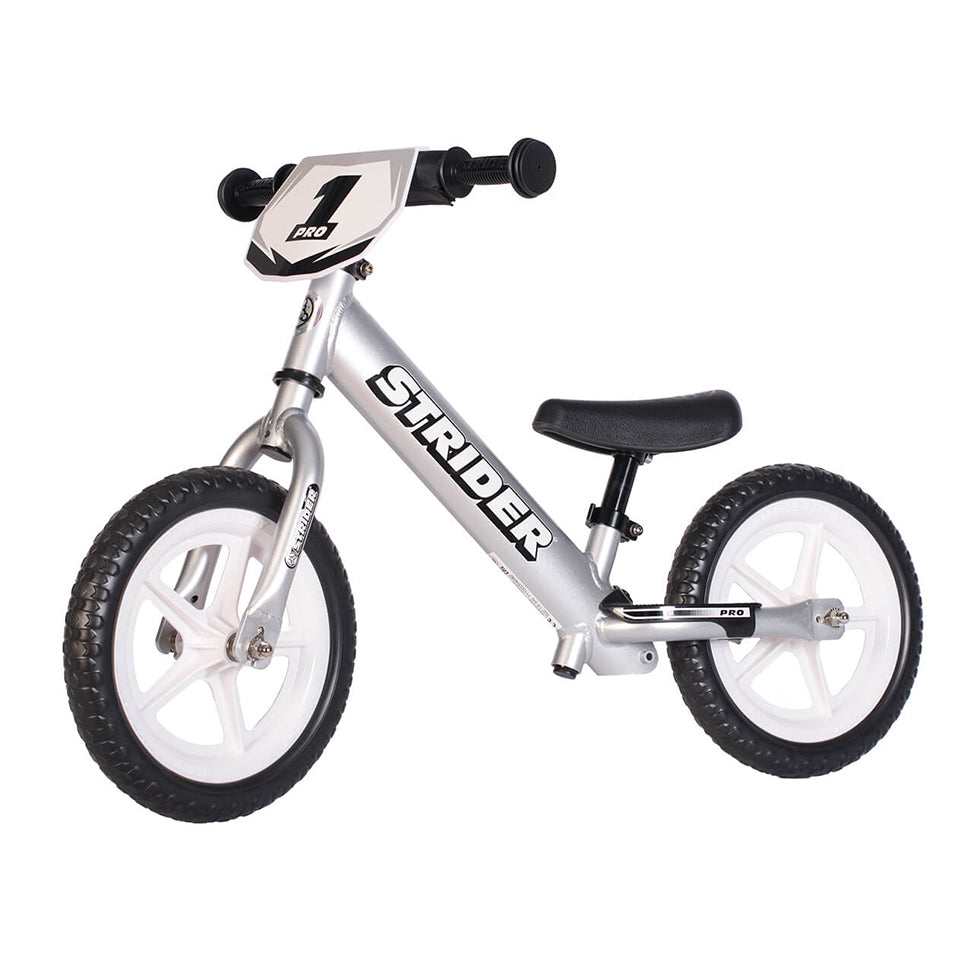 Strider 12 Pro Balance Bike for Kids Ages 1.5-5 Years | No Pedal Toddler Bike with Adjustable Seat | Learn to Ride Training Bike for Boys & Girls | Perfect for Backyard, Park & Neighborhood Rides