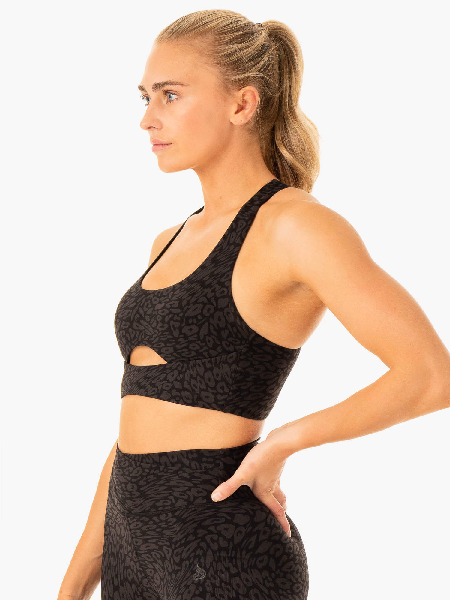 High-Performance Rotation Sports Bra - Black Leopard Print for Yoga, Running & Gym Workouts | Moisture-Wicking & Supportive Activewear