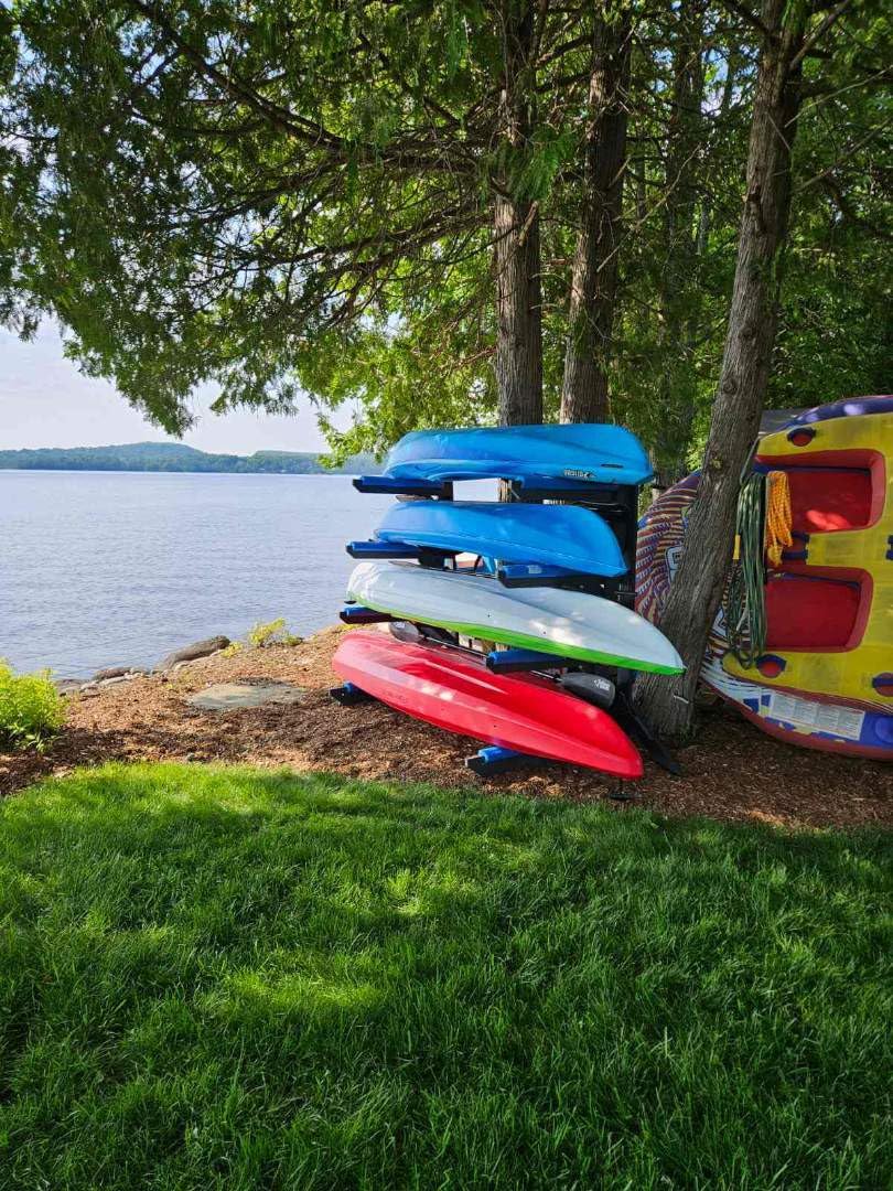 **Freestanding Poly Kayak Storage Rack - Heavy Duty Canoe & SUP Stand for Garage, Outdoor, or Shed - Perfect for Kayak, Paddle Board, and Canoe Organization**