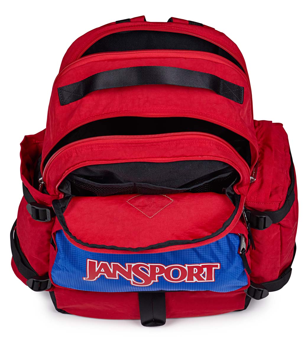 JanSport Seattle Pack Backpack - Durable & Stylish Red Tape Design for School, Travel & Outdoor Adventures