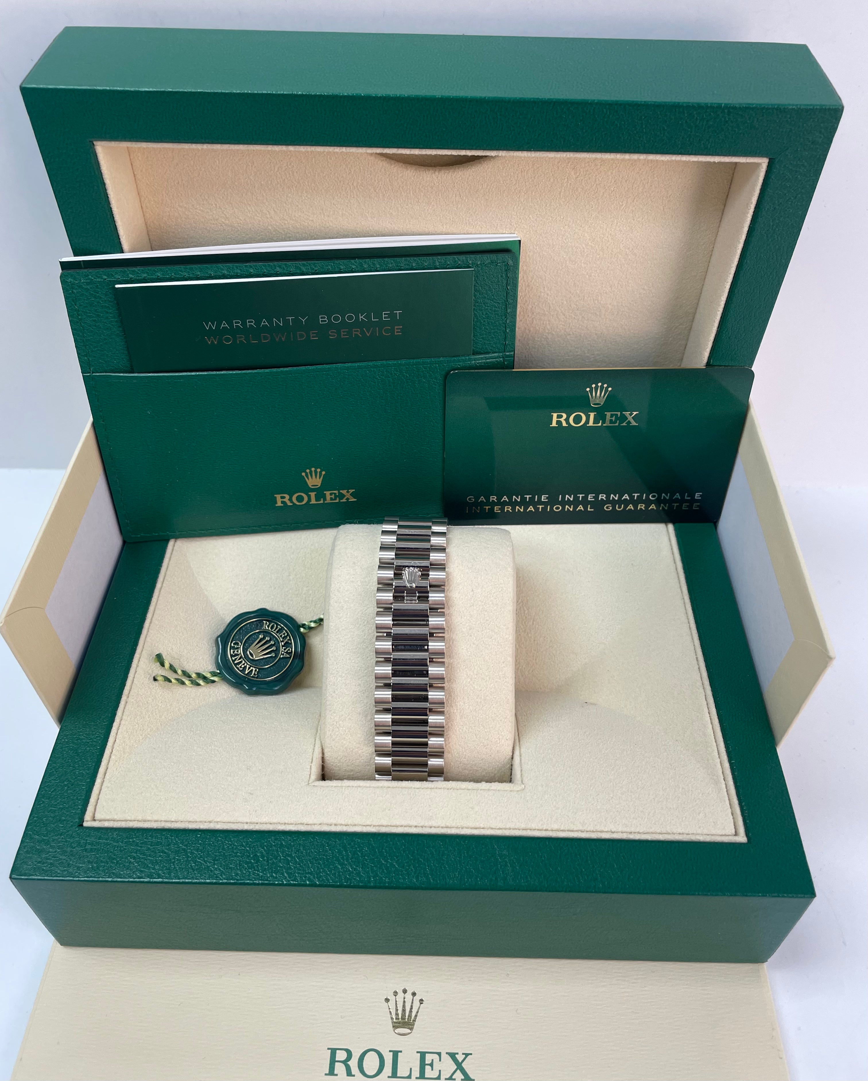 Rolex Day-Date 40mm 18K White Gold Watch with White Roman Dial, Fluted Bezel & President Bracelet (Ref. 228239) - Luxury Dress Watch for Business & Formal Occasions