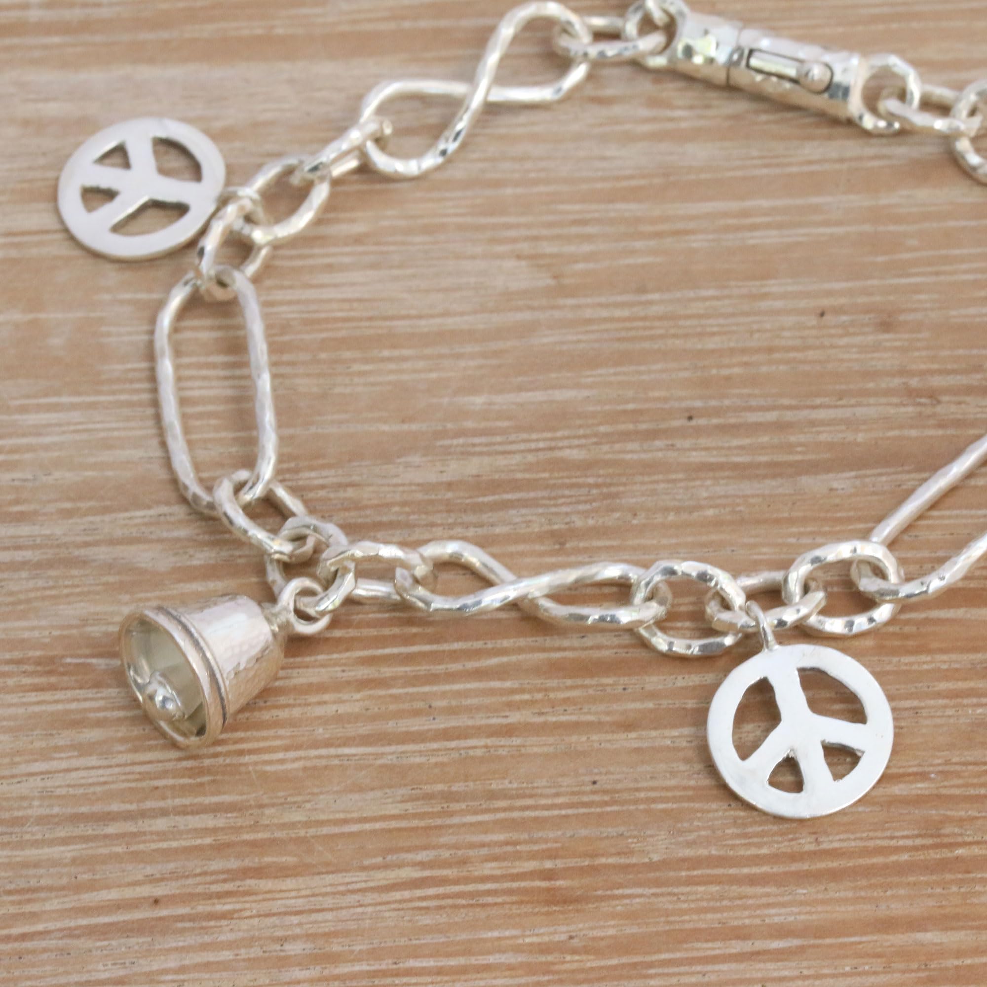 NOVICA Handmade Bali Sterling Silver Peace Symbol Charm Bracelet - 7.5 Inch Adjustable Bangle with Infinity Design - Indonesian Artisan Jewelry for Women - Perfect for Yoga, Meditation & Boho Fashion