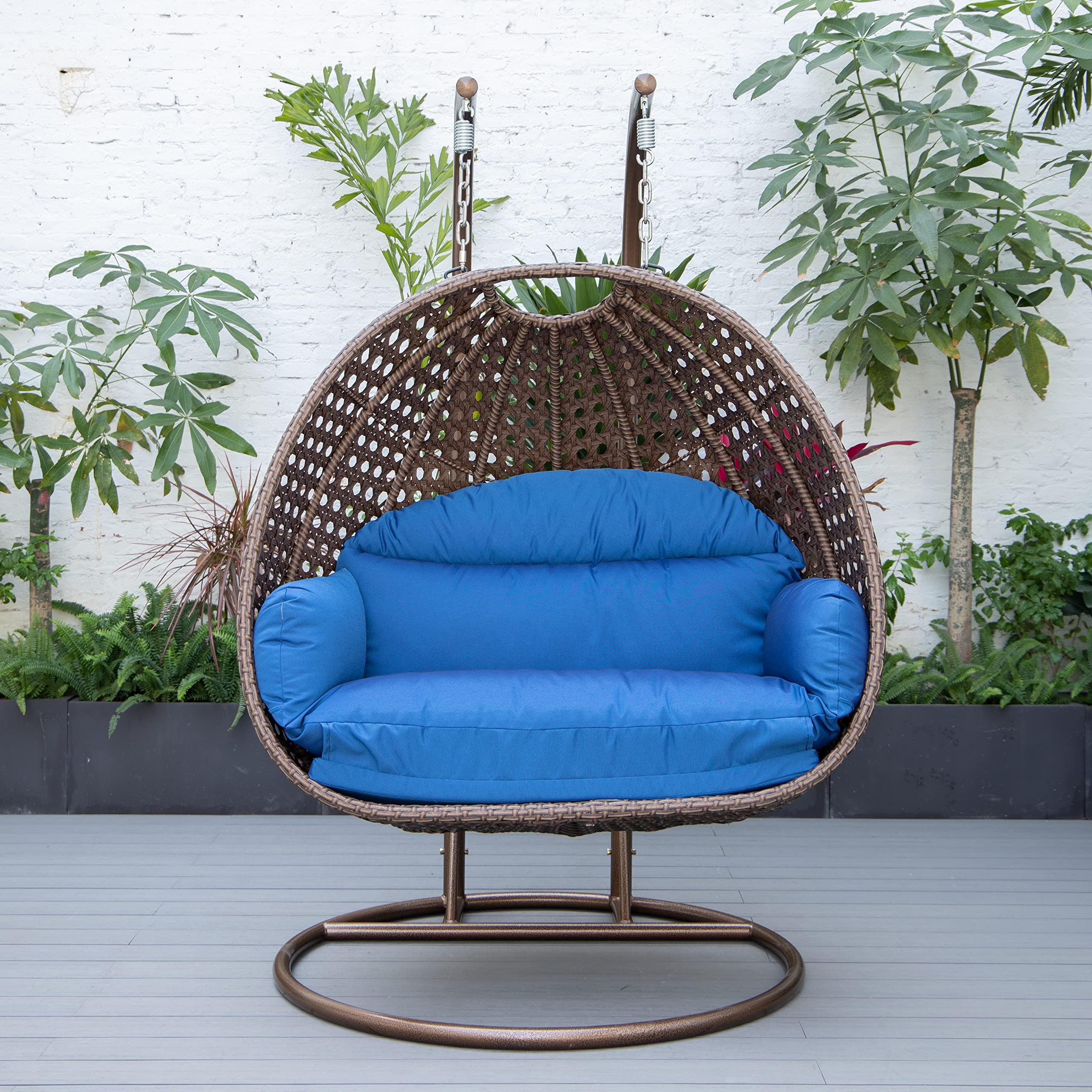 LeisureMod Mendoza Dark Brown Wicker 2-Person Patio Hanging Egg Chair with Stand & Cushions - Indoor/Outdoor Swing for Garden, Porch, Backyard (Blue) - Perfect for Relaxing, Lounging & Enjoying Summer Breezes