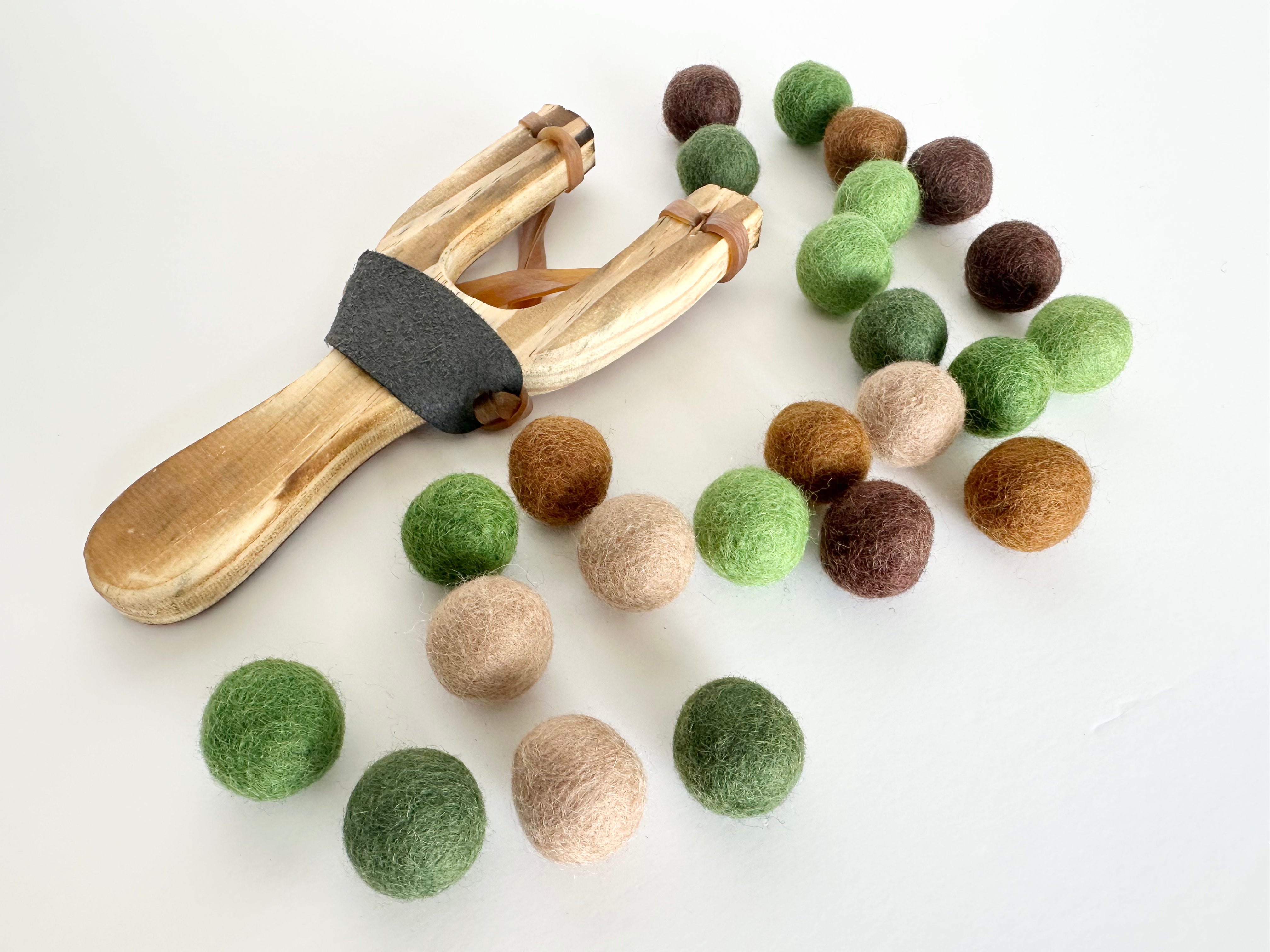 Professional Camouflage Slingshot with 50 Felt Balls - Outdoor Hunting Gear for Survival Training & Small Game Hunting | Perfect for Camping, Backyard Target Practice & Wilderness Adventures