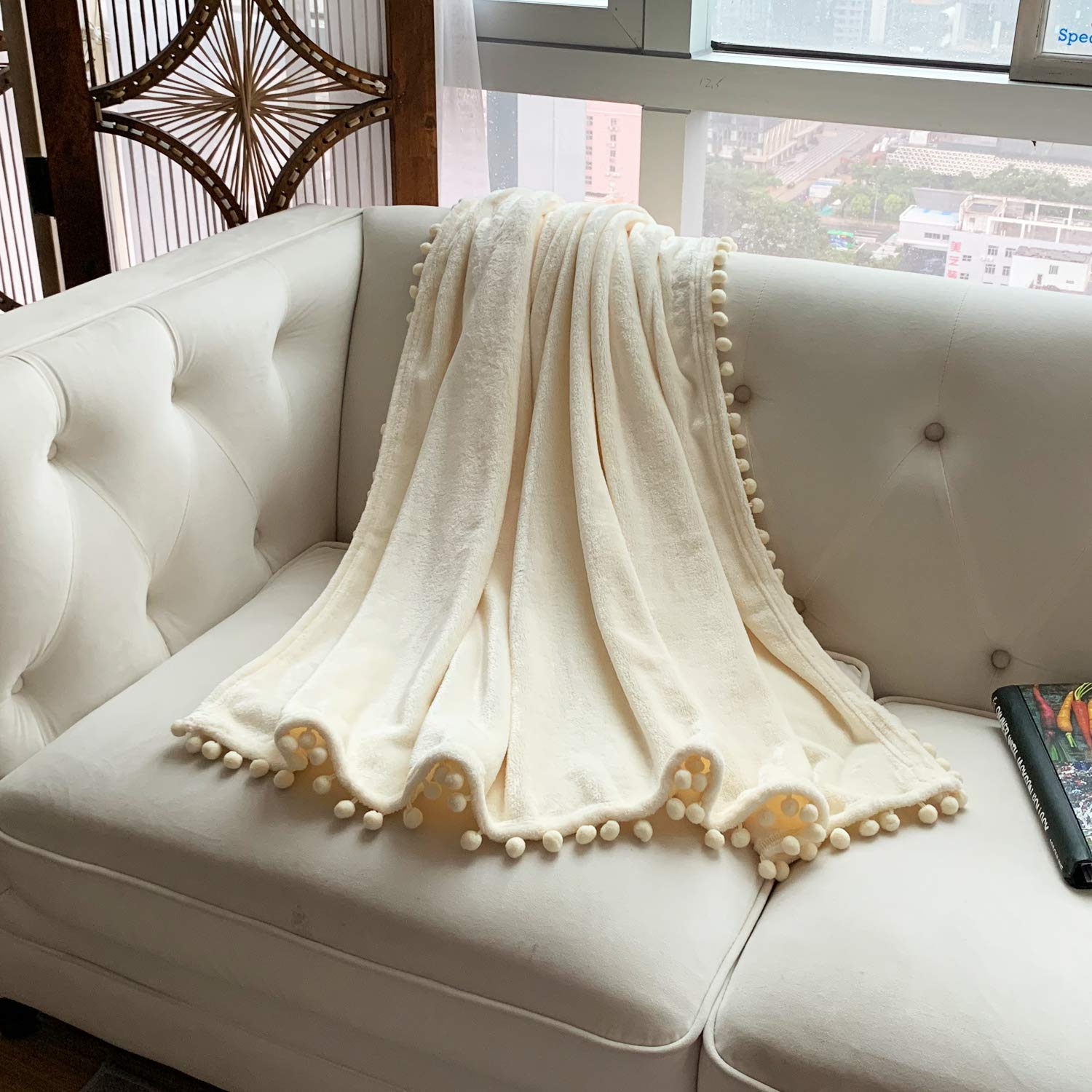 LOMAO Soft Flannel Blanket with Pompom Fringe - Lightweight Cozy Throw Blanket for Bed, Couch & Sofa - All Season Warm Fleece Blanket (Ivory, 51x63 Inches) - Perfect for Home, Office, Travel & Gift Giving