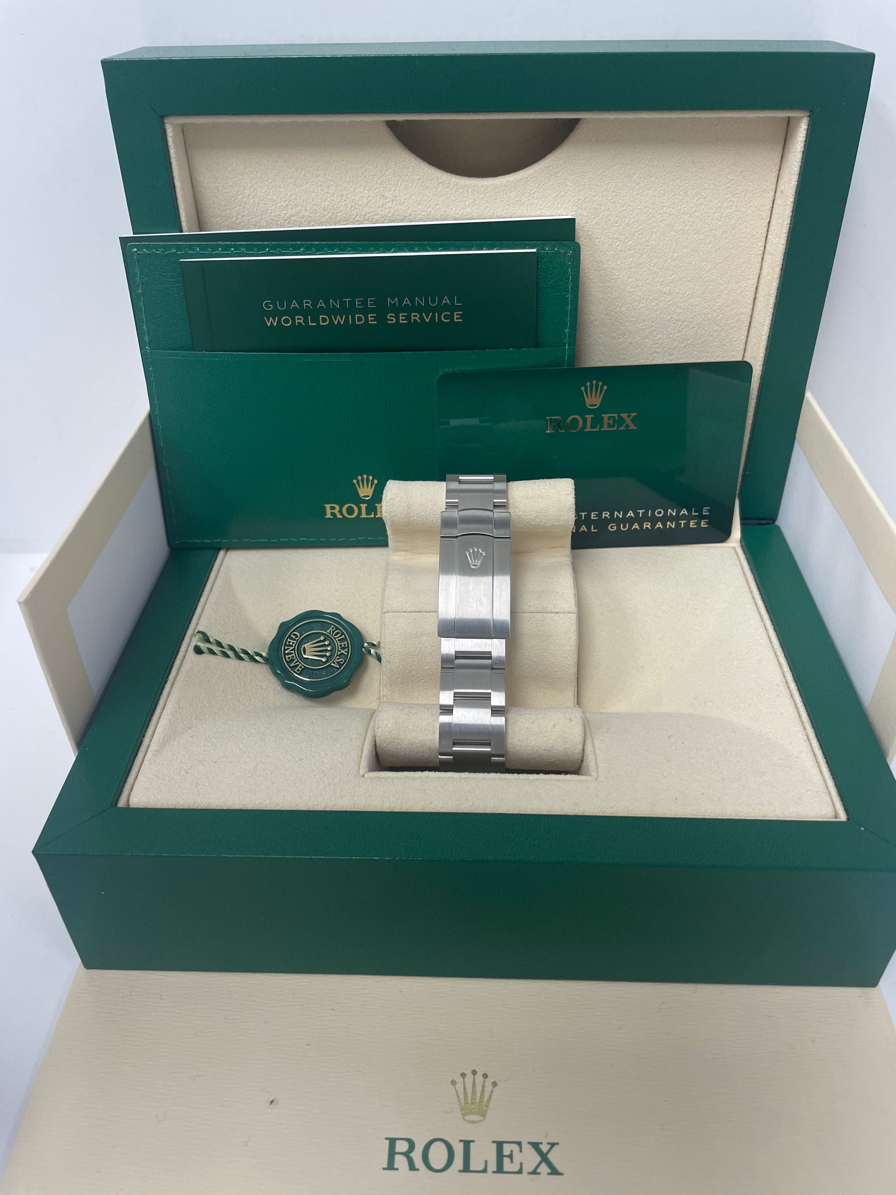Rolex Oyster Perpetual 41mm Men's Watch - Stainless Steel Case, Turquoise Blue Dial, Oyster Bracelet (Ref# 124300) | Luxury Dress Watch for Business & Formal Occasions