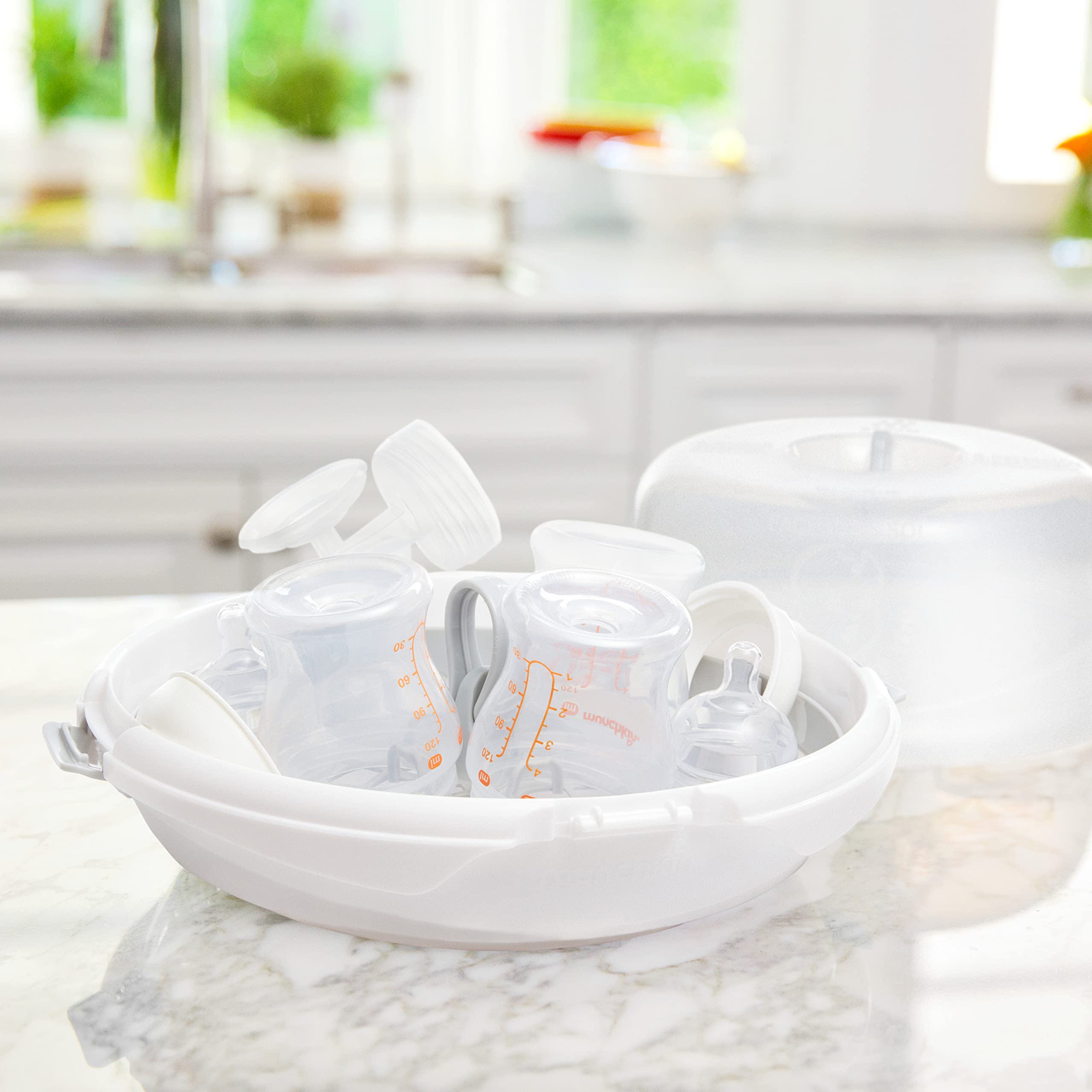 Munchkin® Steam™ Microwave Bottle Sterilizer - White | Fast & Easy Baby Bottle Sanitizer for Breast Pump Parts, Pacifiers & Baby Accessories | Safe for Microwave Use at Home or Travel